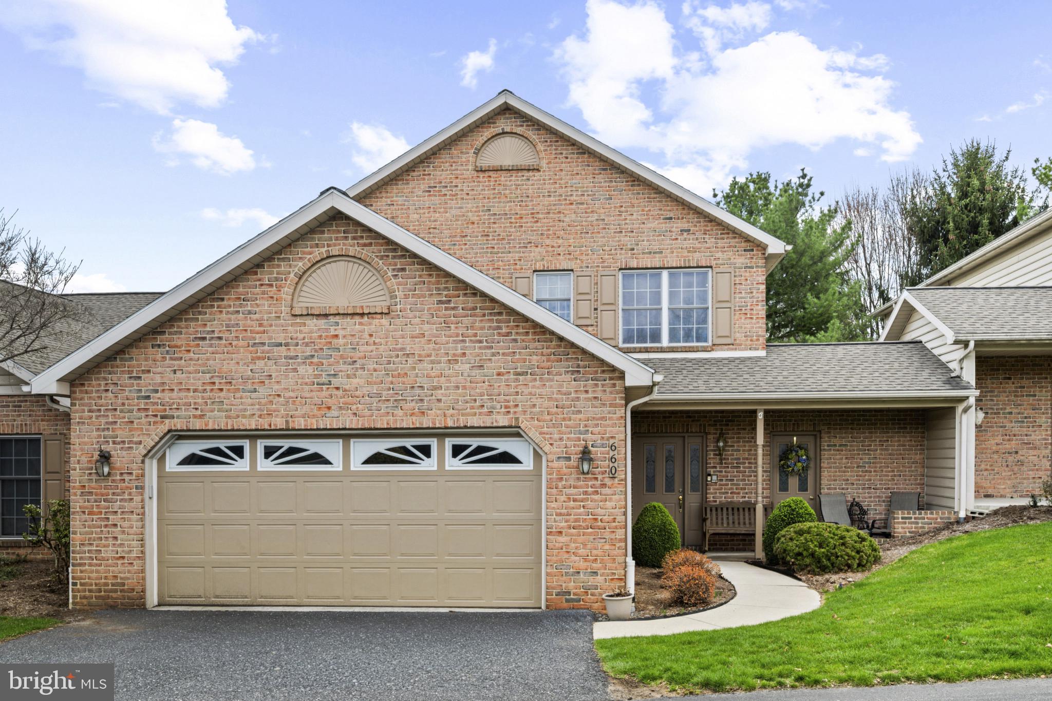 Beautiful 3BR/2.5BA brick townhome with 9 ft. ceilings on both levels and an oversized 2-car garage in desirable Derry Township School District. Located in a quiet 20-unit community on a private road in one of Derry Township’s most desirable neighborhoods, this home offers both privacy and convenience—just minutes from Penn State Health Milton S. Hershey Medical Center, grocery stores, schools, shopping, and major routes.  A large, bright two-story foyer welcomes you into the home, featuring French doors leading to a private office with built-in desk and shelving. The open-concept layout includes a spacious family room with gas fireplace and dining area, flowing into a bright eat-in kitchen complete with Corian countertops, center island, walk-in pantry, double oven, gas range, and abundant workspace for cooking and entertaining.  The spacious primary suite offers two large walk-in closets, double vanity, jacuzzi tub, and separate stall shower.   A large first-floor laundry room adds exceptional convenience with a utility sink, built-in ironing station, hanging rack, and abundant cabinet storage.  In addition to the home’s generous closet space, there is an adjacent storage room with dual access from both the front and rear of the property. The oversized 2-car garage also includes built-in storage above for even more functionality.  Enjoy the quiet, private backyard from the covered porch/patio, complete with an in-ground gas hookup for grilling and outdoor entertaining. Additional features include gas heat, central vac, ceiling fans throughout, and ample storage. HOA services include lawn care and snow removal, providing easy, low-maintenance living year-round. This home offers the perfect blend of comfort, style, storage, and location.