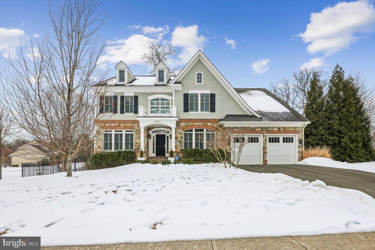 Welcome to an exceptional Oakton residence where elegance, privacy, and refined
living converge. This 5600+ square foot (4072 above grade and 1600 usable on lower level), 5-bedroom, 4.5-bath home offers the perfect balance of tranquility and convenience. The house is perfectly situated on a quiet cul-de-sac next to a large protected green space that creates a remarkable sense of openness. 

This peaceful, small development provides a relaxing environment while still being minutes from top-rated schools, beautiful parks, upscale dining, premier shopping in Vienna and Tysons, and convenient access to major commuter routes and Washington, D.C.

This thoughtfully designed Sekas-built home blends sophistication with comfort, offering generous light- filled living areas, high ceilings, and elevated finishes throughout. Designed for both grand entertaining and effortless daily living, the flowing floor plan creates a seamless connection between formal and casual spaces.

At the heart of the home, the beautifully upgraded kitchen features quartz countertops, a large island, high-end cabinetry, a large pantry, a Thermador range, and dual wall ovens — ideal for both everyday cooking and hosting on any scale. A beautiful and flowing dining and formal living room flank a grand entry.  A welcoming family room is designed around a gas fireplace with a beautiful, hand-made mantel.  Enjoy the convenience of a bright and airy first floor office space overlooking backyard greenery.

Upstairs the luxurious primary suite serves as a private retreat highlighted by a spa- inspired bathroom with heated floors, an oversized walk-in shower, and a deep soaking tub designed for complete relaxation.  The primary suite has a separate sitting area and two spacious walk-in closets.  Three additional spacious bedrooms, one with en-suite bath, and a second-floor laundry complete the upper level. A bright, open staircase with floor-to-ceiling windows overlooks the neighboring green space.

The light-filled lower-level walk-out living area provides maximum versatility for family, guests, or multi-generational living. It includes an additional bedroom with en-suite bathroom, an expansive living area with gas fireplace, and a bonus room — perfect for use as a home gym, office, play space, or easily converted into a sixth bedroom if desired. Though plenty of storage is available throughout the home, this level also has a vast storage room.

Exceptional outdoor living areas, perfect for entertaining, relaxing evenings, or play, are accessible from the both main and lower levels. Enjoy a large deck situated off the kitchen, a beautifully designed patio accessible from the deck or lower level with outdoor stone fireplace, TV, and sound system, and a fully fenced back yard. All exterior areas have been meticulously landscaped for year-round enjoyment and include an in-ground irrigation system.  

This home has been well-maintained and thoughtfully upgraded. Tray ceilings, crown moldings, and abundant natural light are just some of the features you will enjoy. Some of the many upgrades include two whole-house water purification systems, recently painted interior and exterior, new carpet on lower stairway, wooden shutters, glass-inset cabinet doors, high-end light fixtures, and expanded recessed LED lighting.  This is more than a home — it is a statement of lifestyle, comfort, and luxury.

Sold by Owner/Agent