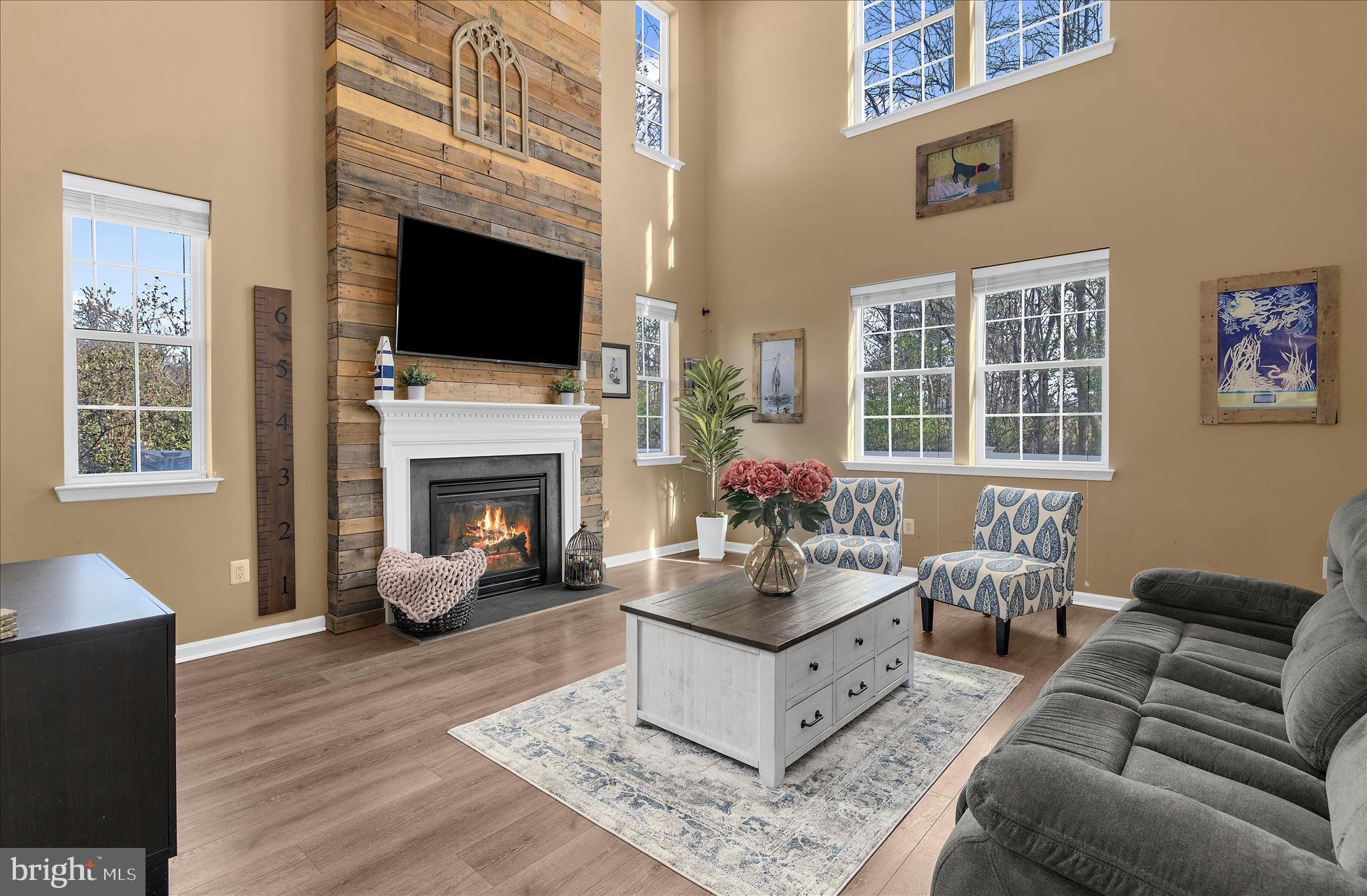 Welcome to 427 Brookfield Drive, a move-in ready home in Centreville's sought-after NorthBrook community, offering the perfect blend of space, comfort, privacy, and energy efficiency.

Situated on a premium lot backing to White Marsh Park, this 4-bedroom, 2.5-bath home offers over 2,500 square feet of thoughtfully designed living space with no homes directly behind, providing peaceful views and a private backyard setting.

The main level features a bright, open floor plan ideal for both everyday living and entertaining. The spacious family room showcases vaulted ceilings and a cozy propane fireplace and flows seamlessly into the kitchen, complete with granite countertops, stainless steel appliances, a double oven, and center island. A dedicated home office/flex space and convenient half bath add versatility for today's lifestyle.

Upstairs, the spacious primary suite offers a private retreat with an en-suite bath and oversized walk-in closet. Three additional bedrooms, a full bath, and an upper-level laundry room provide the functionality buyers are looking for.

One of the home's standout features is its energy-efficient solar panel system, helping reduce electricity costs while providing long-term savings and sustainability. Additional recent improvements include a new roof with transferable warranty (2023), luxury vinyl plank flooring (2024), new upper-level carpeting (2026), updated kitchen appliances, a vinyl privacy fence (2022), a new garage door (2024) and freshly painted interior. 

Enjoy all that NorthBrook has to offer, including walking trails, a playground, soccer field, and pavilion. Conveniently located just minutes from Historic Centreville, the Centreville Wharf & Public Landing, local parks, restaurants, shopping, and only 25 minutes from the Bay Bridge.

If you've been searching for a well-maintained, energy-efficient home with modern updates, flexible living space, and a private setting, 427 Brookfield Drive is a must-see.