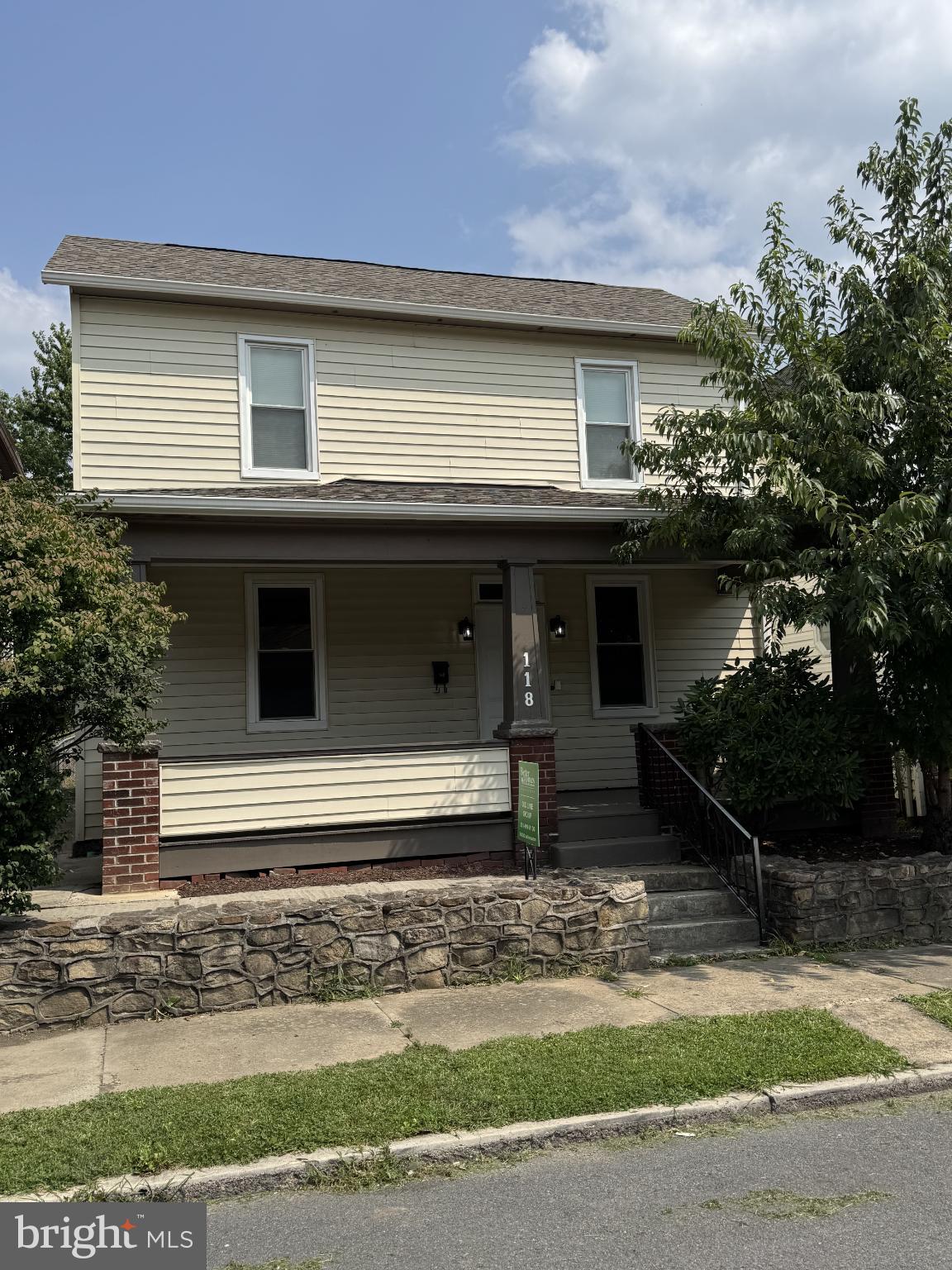 This beautiful 2-story house was fully renovated and is move in ready. The first floor of this home includes a living room, dining room, kitchen, full bath with tub and mudroom with washer and dryer hook-ups. The upstairs has two bedrooms, a half bath, a common area, and a stairway to the attic. There are beautiful hardwood floors and full-size windows. Kitchen includes a refrigerator, range, over the range microwave and dishwasher. Appliances are black and stainless steel. The wiring, plumbing and windows were all updated during renovations. In 2019, the roof was replaced and a new HVAC system was installed in 2018. The home is heated by a high efficiency heat pump forced air furnace. This home also includes a front porch, fenced in backyard, detached 3 car garage with upper storage area and private off-street parking. The rear alley dead ends at this property. 

Home is minutes from Downtown Cumberland, Allegany College of Maryland, UPMC Western Maryland Hospital, recreational parks and trails, and access to Interstate 68. It is also a short drive to Frostburg State University and Northrup Grumman in Rocket Center, WV. 

Complete List of Renovations/Updates: 

2025 - New Exterior Light Fixtures 

2024 - New Roof on Detached 3 Car Garage, New Window in Detached Garage, New Gutters & Downspouts on House & Detached Garage, New Flooring on Front Porch, Windows Wrapped in Aluminum, New Refrigerator, New Stove 

New Over the Range Microwave, New Roof on House (2019), New Heat Pump Forced Air HVAC System (2018), New Wiring in Garage, New Plumbing throughout House, New Wiring throughout House, New Insulation in House, New Bathrooms Installed, New Kitchen Installed, New Windows (Double Hung, Double Pane, Low E/Argon Vinyl) & Exterior Doors Installed, Hardwood Floors Refinished,  New Garage Doors on Detached Garage