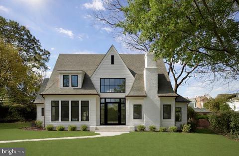 Construction is almost complete. Get ready to fall in love with this home on 34th St NW, a stunning new masterpiece nestled in the coveted Forest Hills neighborhood. Coming to market at the end of April, this home by Dogwood Restoration is a true showstopper, designed to impress with six bedrooms, five and a half baths, and three sun-drenched levels of thoughtfully reimagined living space. 

The heart of the home is the light-filled chef’s kitchen, a dream come true for anyone who loves to cook or entertain. Picture yourself gathering around the expansive island or enjoying casual meals at the built-in banquette. A walk-in pantry and butler’s pantry seamlessly connect the kitchen to a dining room spacious enough to host all your favorite people—think dinner parties for 12+! The open-concept design flows effortlessly into the family room and out to the backyard, perfect for al fresco dining under the stars. On the main level, you’ll also find a bright and versatile living room that could double as a private office. But the real surprise here? A main-floor bedroom suite bathed in natural light. Whether you use it as a guest suite, playroom, rec room, or additional workspace, the possibilities are endless. 

Head upstairs to discover four oversized bedrooms, including a luxurious primary suite with a jaw-dropping walk-in closet and a spa-inspired bath. Imagine starting your mornings with heated floors, dual vanities, a serene soaking tub, and a spacious glass-enclosed shower. It’s your own private retreat. The third level offers even more flexibility, with a lounge area, office nook, an additional bedroom, and a full bath—ideal for guests, hobbies, or working from home. Outside, the home is just as inviting, featuring a beautiful patio for entertaining, a detached garage, and plenty of room to relax or play. This six-bedroom, five-and-a-half bath stunner blends elegance, modern living, and endless versatility. Don’t miss your chance to call it yours!