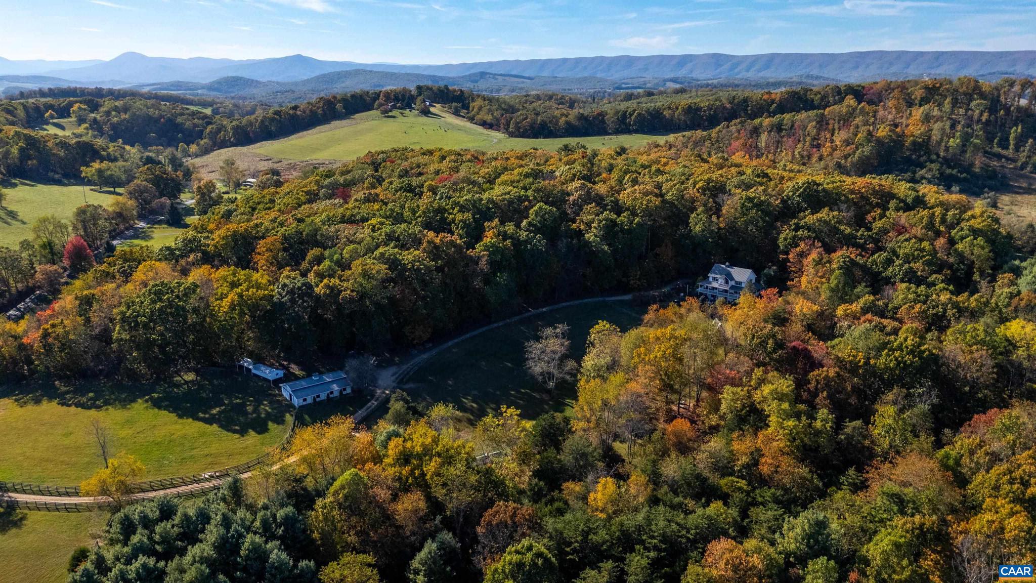 Welcome To Morley Ridge Park.  Nestled in the heart of the Shenandoah Mountains, this breathtaking 111-acre equestrian luxury estate offers a rare combination of privacy, natural beauty, and fully equipped farm functionality. Surrounded by sweeping Blue Ridge Mountain views, this property is a true retreat?ideal for equestrians, outdoor adventurers, or those seeking a legacy mountain estate. The custom-built home features 4 bedrooms and 3.5 baths, including a flexible lower-level suite perfect for multi-generational living. Designed with both comfort and elegance in mind, the home showcases a gourmet kitchen with distressed cherry cabinetry, granite countertops, Sub-Zero refrigerator, Dacor double ovens, and a spacious center island?perfect for entertaining. Expansive windows and skylights flood the home with natural light while framing stunning mountain vistas throughout the living and dining spaces.  Step outside and experience a fully operational, vertically integrated horse farm.  A truly one-of-a-kind Shenandoah Mountain estate.  A private luxury retreat, surrounded by the beauty of the Blue Ridge Mountains.,Cherry Cabinets,Granite Counter,Fireplace in Living Room