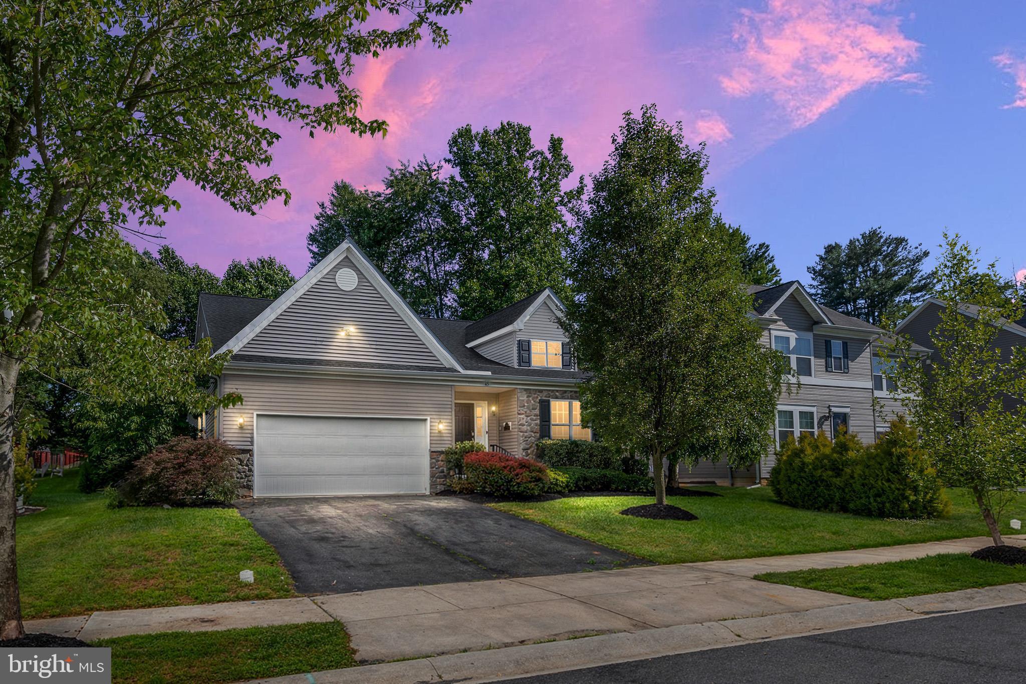 Surrounded by mature, thoughtfully curated landscaping, this move-in ready 4-bedroom, 3-bath home boasts a backyard paradise complete with a spacious patio, elegant pergola, lush lawn, and soothing hot tub, providing a serene escape for relaxation and entertaining alike in the sought-after South Stream community.  The foyer welcomes you with rich hardwood floors and a pleasing neutral color palette that sets the tone throughout the home. Just beyond, the formal dining room showcases a soaring ceiling, creating an elegant space for entertaining.
The well-appointed kitchen features stainless steel appliances, including a newer gas range, granite countertops accented by a designer backsplash, a center island, 42-inch cabinetry, a double sink, and a pantry. The adjacent family room serves as the heart of the home, offering an open and airy layout with a casual dining area, soaring vaulted ceiling, and a cozy gas fireplace. Doors on either side of the fireplace lead to the patio and hot tub, where the beautifully landscaped backyard provides a peaceful and private setting for relaxation and outdoor enjoyment.
Back inside, the convenient main-level primary suite offers a spacious retreat complete with an en suite bath and walk-in closets. A second bedroom, an additional full bath, and a main-level laundry room complete this floor.
Upstairs, you will find two additional bedrooms, including one featuring an eye-catching barn door and walk-in closet, along with a full bath.
The unfinished basement presents endless possibilities to create the space you've always wanted, whether it be a recreation room, home gym, office, or additional living area. Recent updates include a new air conditioning unit, a LeafFilter gutter protection system installed approximately two years ago, and a roof that is only seven years old. This exceptional home is move-in ready and waiting for you to make it your own.
Note:  Hot tub and Pergola are included in as-is condition.