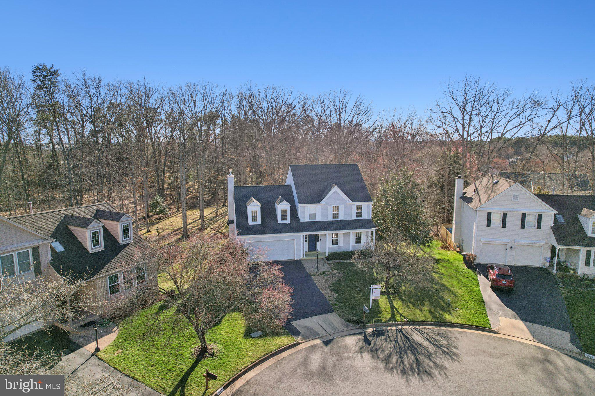 Situated in a quiet cul-de-sac, this stunning 5-bedroom, 3.5-bathroom Colonial home sits on a picturesque, wooded half-acre lot. A charming front porch welcomes you into a beautifully updated interior, featuring a renovated kitchen perfect for culinary enthusiasts. The home boasts a spacious living room and a formal dining room, ideal for entertaining. The cozy family room, complete with a gorgeous stacked slate-surround gas fireplace, provides the perfect space to relax.

The luxurious primary suite is a true retreat, featuring a one-of-a-kind spa bathroom designed for ultimate relaxation.

Step outside to an entertainer’s dream—an expansive deck, a screened porch, a soothing hot tub, and a patio, all overlooking the serene backyard. Additional highlights include a generous laundry room and a convenient storage shed. Lawn Irrigation System. 

Tucked away in a peaceful setting yet close to shopping and other daily necessities, this home offers the perfect balance of privacy and convenience. Enjoy effortless commuting with the VRE station just 5 minutes away and easy access to the Parkway, ensuring quick connections to major routes.

Don’t miss this opportunity to own a peaceful retreat with modern upgrades and exceptional indoor and outdoor living spaces!