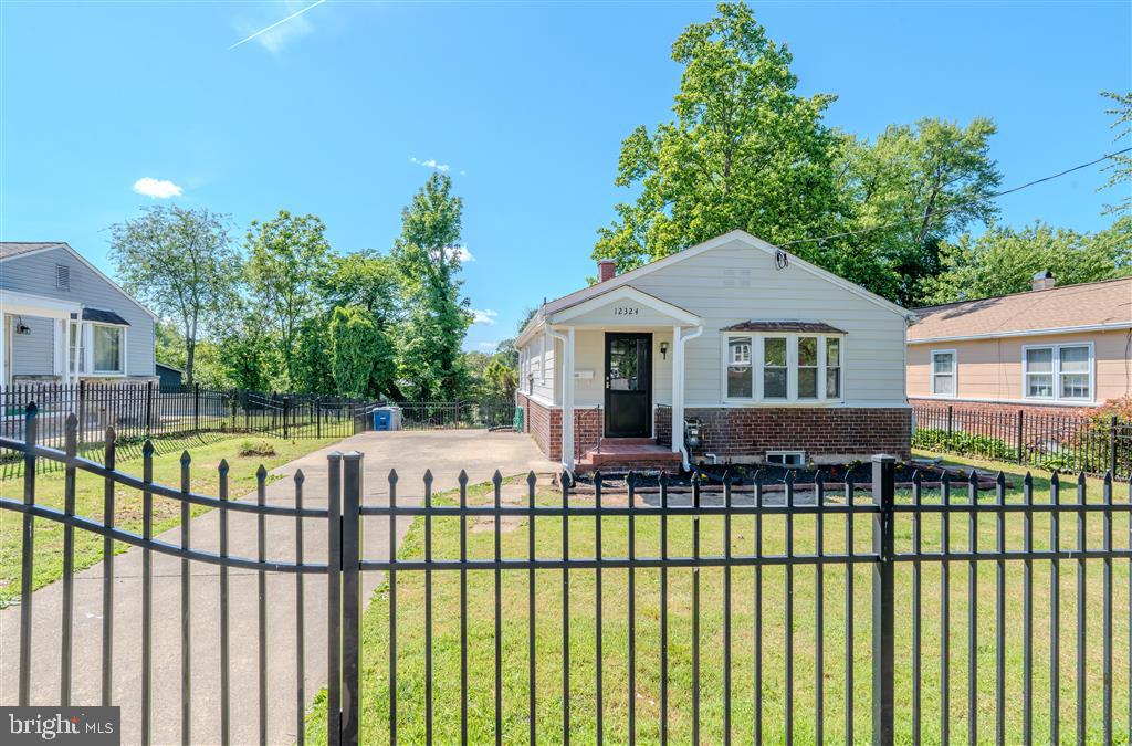 Beautifully upgraded single-family residence located in Silver Spring, Montgomery County, Maryland. The property offers access to major commuter routes, public transportation, shopping centers, dining, recreational facilities, and local schools.

This home features 3 bedrooms and 1 fully upgraded bathroom on the main level. The fully finished lower level includes 1 bedroom and 1 full bathroom, along with a living area and kitchen, offering a flexible and functional layout.

Significant capital improvements have been completed throughout the property. Major system upgrades include a roof replacement completed in 2020 and a new HVAC system installed in 2018, providing improved efficiency and reliability.

The exterior has been refreshed with professional cleaning, pressure washing, and a neutral gray paint finish, improving overall curb appeal. The property includes a fully fenced perimeter with newly installed black fencing and gated access, providing defined outdoor space and privacy.

Interior spaces have been updated with fresh paint and new vinyl flooring throughout. All bathrooms include updated vanities, faucets, shower systems, sliding glass doors, and shower bases.

The kitchen has been upgraded with new countertops and new appliances, including refrigerator, microwave, dishwasher, stove, and washing machine. An additional refrigerator is located in the basement for added storage. All interior doors have been replaced with modern-style doors.

The property includes two separate entrances: one for the main level and a private entrance for the fully finished lower level.

The property is situated on a 7,216 square foot lot and includes completed landscaping with outdoor space suitable for recreation or play.

Parking includes a private driveway with space for 3 vehicles, along with additional street parking in front of the property.

A standby generator has been installed, providing backup power during outages.

This home offers extensive upgrades, functional improvements, and a convenient Silver Spring location.