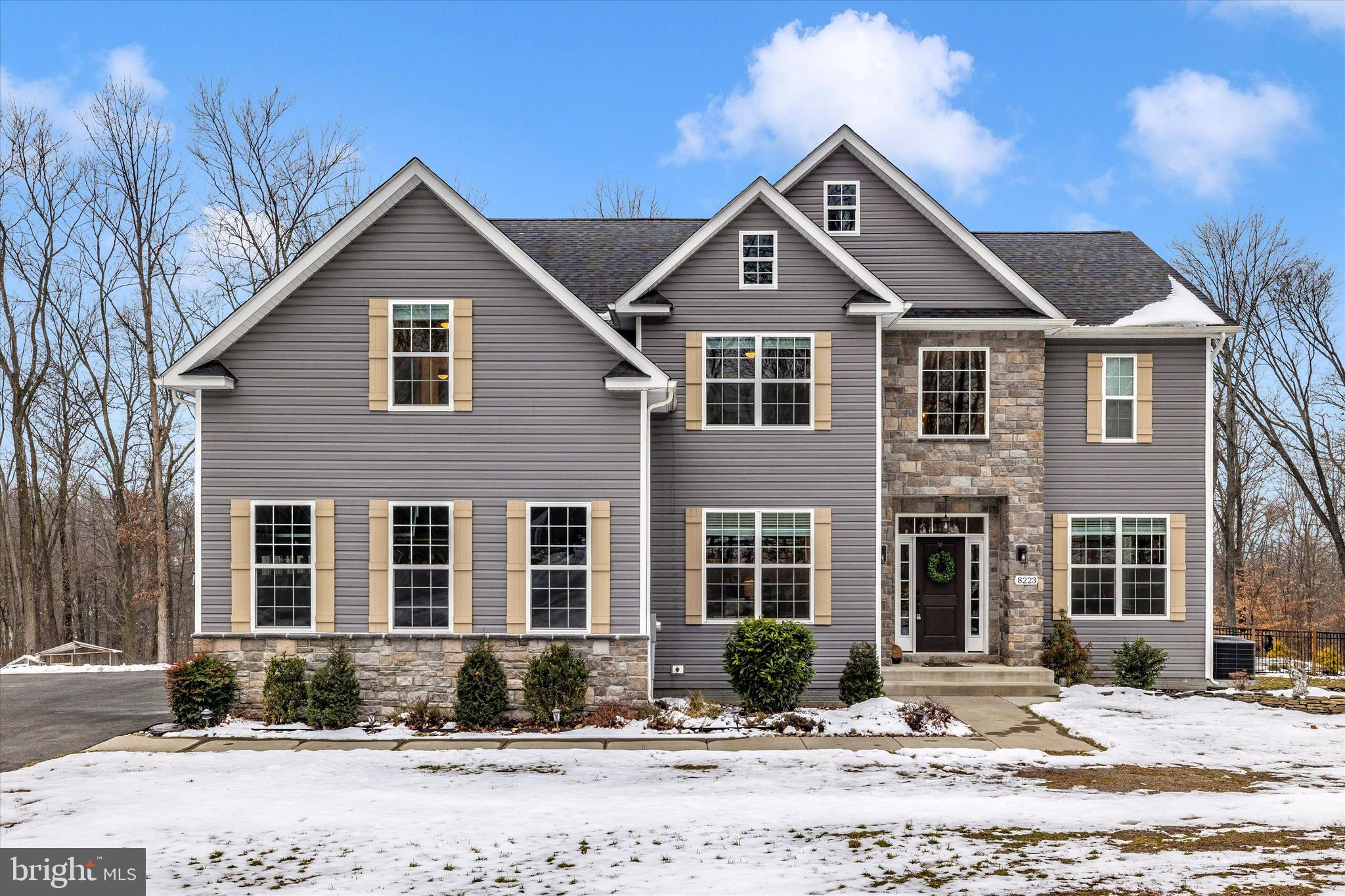 Gorgeous Custom-Built Home situated on 8.69-acre, mostly wooded lot, with long driveway. Upon entry to the main level is situated, on either side of a 2-story foyer, an office and a living room. Continue through the foyer to a beautiful open floor plan with gourmet kitchen and expansive dining area that leads to a 2-story family room with a stone gas fireplace.  On the main level is a hand-crafted barn door to the very ample mud room that leads to the 3-car side load garage. In the foyer is a beautiful wood and rod iron staircase leading to the second level that boasts 4 bedrooms, a den, 3 full baths and a balcony to overlook the 2-story family room. Watch unbelievable sunsets out of the 8 large windows in the 2-story family room or outside from the expansive deck.  Backyard includes an amazing outdoor entertainment area with fire pit and fenced in heated inground concrete/gunite pool. Custom blinds throughout and high-end finishes. Located in the Urbana School District. This home will not last long.