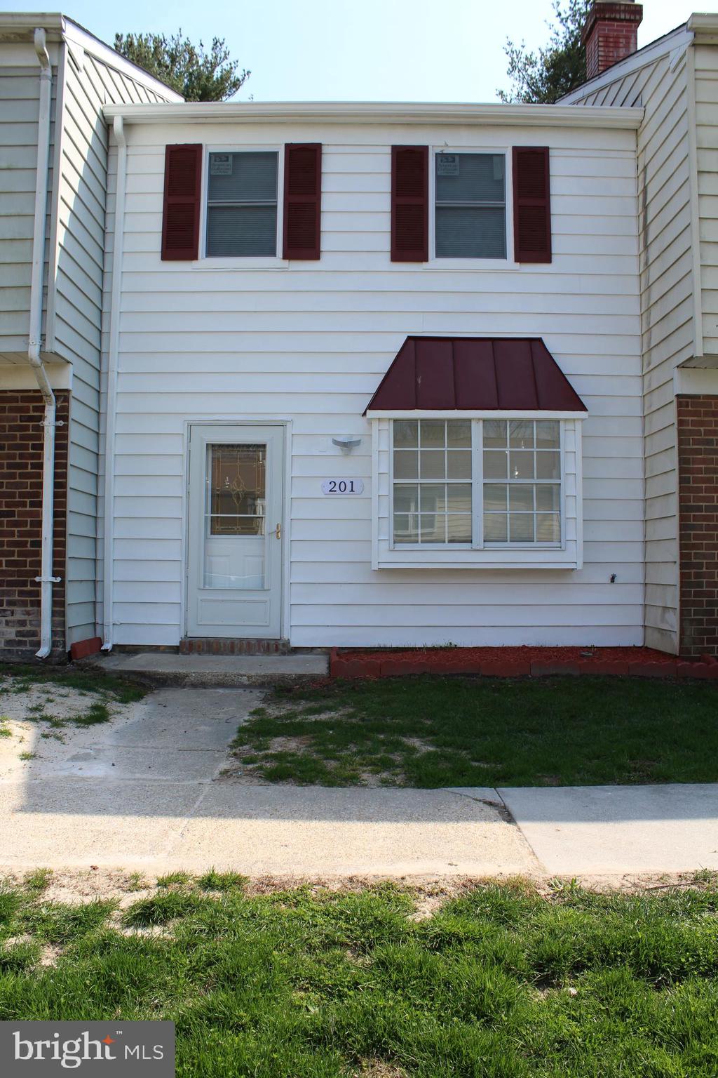 CASH OR CONVENTIONAL FINANCING  W/10% DOWN ONLY.   Condo association is not FHA/VA approved.  We have condo resale package in hand. Title work is completed by Universal Title. Affordable two story condo completely remodeled.  2 bedrooms, 1.5 baths and shows beautiful. New wood laminate flooring on main level and new carpet upstairs. Huge master bedroom with walk-in closet. New roof and new windows upstairs and new slider door off kitchen. Entire home has been freshly painted.  Large kitchen with new white cabinets-counter top and new island with granite top. Brand new Samsung or Frigidaire stainless steel appliances. 1st floor laundry with new Maytag stackable washer/dryer and new water heater. All new bathrooms and interior doors. Condo fee is $180/monthly which includes community pool, assigned parking space and playground. Water & trash included in condo fee. Easy access to Rts 97 & 695, great commuter location for those traveling to Baltimore, Annapolis & Washington, DC.  and only minutes to grocery/shopping/restaurants/movies. This home is move-in ready.