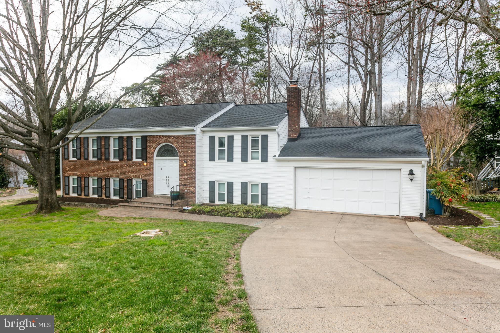 Open house cancelled.  This gorgeous, well maintained home on a corner lot is inviting from the moment you pull up.  It boasts approximately 2600 finished square feet on both levels!  It has been freshly painted throughout and is absolutely move in ready.  It has brand new stainless steel appliances and brand new carpeting on the lower level.  From the gleaming hardwood floors to the expansive amount of light throughout the house via the solar tubes, you'll just love it!  This home features 3 bedrooms and 2 full baths on the upper level and 2 full bedrooms and 1 recently updated full bath on the lower level (with heated floor) in addition to the huge family room with wood burning fireplace.   Plus, it has a 2 car garage, deck, replacement windows and door and in ground sprinkler.  Located in the highly desired Saratoga neighborhood, it's walking distance to the Saratoga shopping center and is just minutes from 495/95/395, Springfield Metro, Fort Belvoir and NGA as well as commuter bus stops.  And......there is a community pool available by membership!