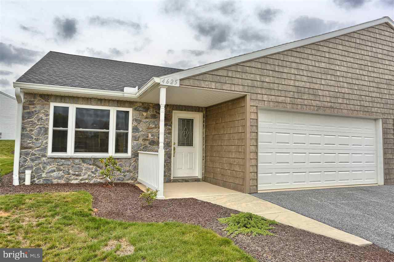 Move in ready end unit with lots of upgrades at this price! Popular Laurel Manor offers one floor living without breaking the bank! Lots of natural light and a free flowing open floor plan. Very modest HOA fees too! Ready for you now!