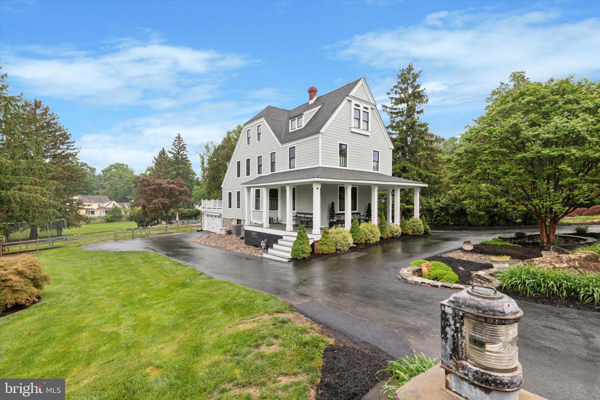 Welcome to 802 Upper Gulph Road.   This turn of the century Victorian has been the beneficiary of a complete transformation, meticulously executed over the past nine years, offering a move-in ready, walk-to-Wayne property for the next lucky owner.  Highlights include 3,223 square feet of luxurious above grade living space, covered wrap around front porch with composite decking, five bedrooms, three full and one-half bathrooms, two-car side entry garage, expanded driveway and parking areas, massive composite deck, renovated salt water pool, sport court, level one-acre fenced lot, and very reasonable property taxes.  Recent improvements include: pool renovation including conversion to salt water and new surface, coping, and pavers (2016), driveway resurfacing (2016), removal of antiquated electric service and installation of new Romex (2017), new roof (2018), new windows throughout (2019), new Hardie plank siding and Azek trim, new composite front porch, columns, and steps (2020), new composite rear deck, rails, and steps (2020), new split rail wood fence (2021), added central air conditioning (2022), converted from oil to natural gas (2023), new gas boiler for heat and domestic hot water (2023), gourmet kitchen renovation including custom cabinetry, stainless steel appliances, quartz countertop, heated floor, and tile backsplash (2023), laundry room renovation (2023), new storage shed (2024), garage transformation including new drywall and floor (2024), finished lower level full bathroom off garage and close to pool (2024), added electric car charger (2024) , and 3rd floor primary bathroom renovation (2025) highlighted by a massive walk-in stall shower with tile floor and frameless glass enclosure.  This amazing property seamlessly blends old world charm, thoughtful improvements, a functional floorplan, and incredible indoor and outdoor entertaining spaces.   Part of the top-rated Tredyffrin Easttown School District and Devon Elementary School, this property is conveniently located close to all major commuter routes, several regional rail stations, shopping, dining, parks, trails, and everything the Main Line has to offer.