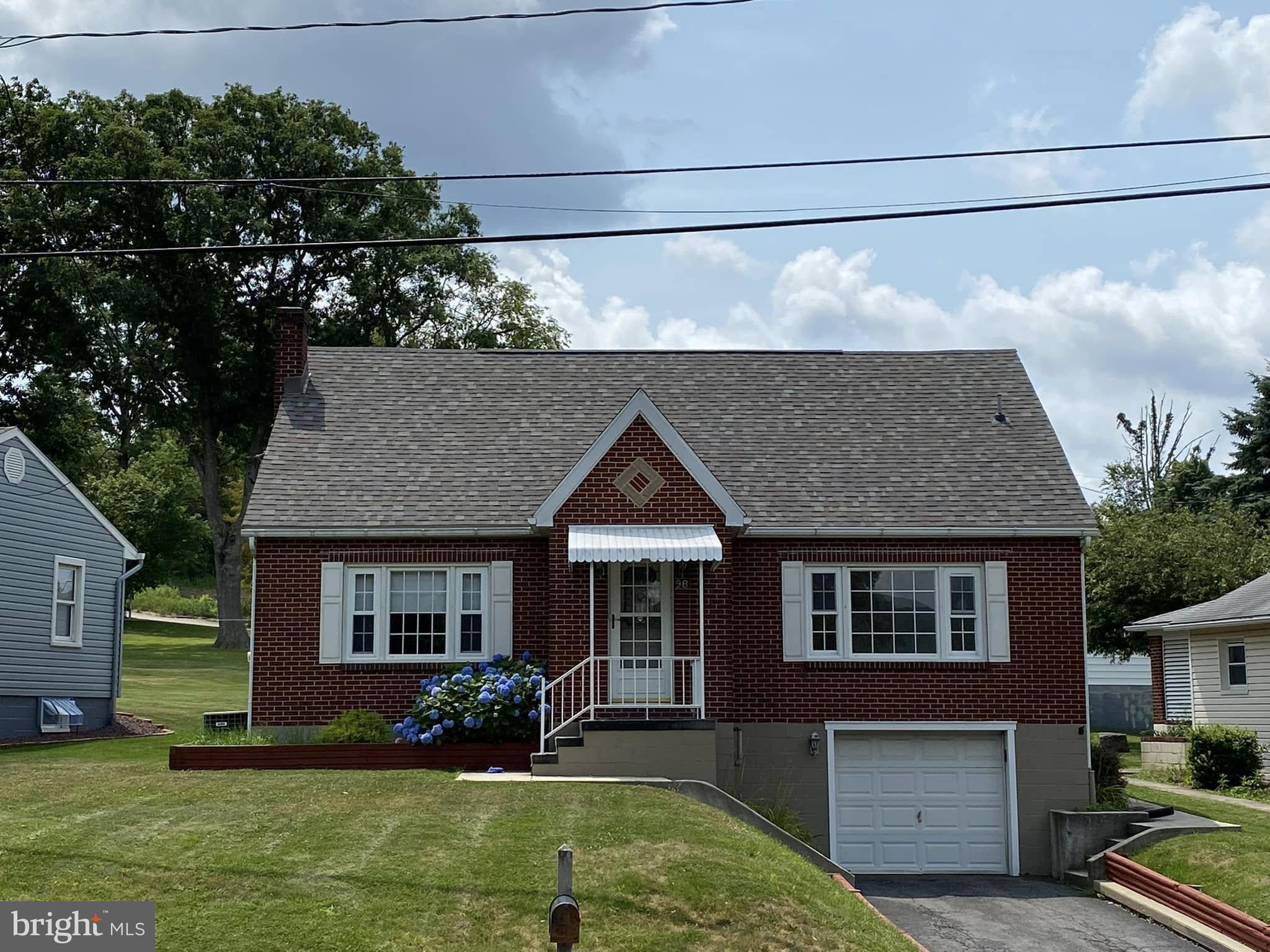 Frostburg - Near FSU and convenient access to I-68 this beautiful, brick, 3 Bedroom 1 Bath, features: hardwood floors, updated kitchen and bath,  a basement rec room and laundry. a level lot, large 2-car detached garage and it's in EXCELLENT condition.