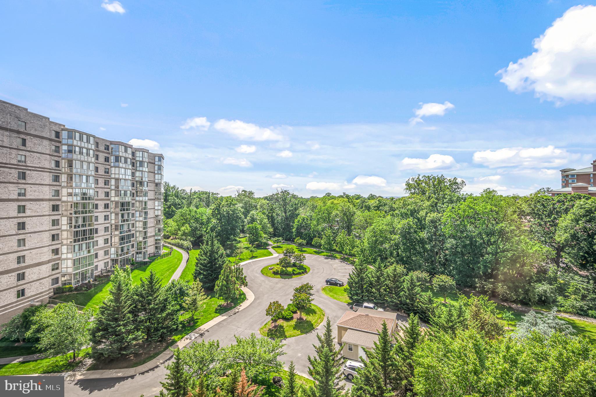 PRICE REDUCTION! Incredible opportunity for investors OR if you are downsizing in late fall or early 2027. . Enjoy this beautiful 3 bedroom/2 bath condo  with a garage space (BG-44) at the highly desirable 55+ community of Lansdowne Woods.  This lovely condo spans a generous 1560 square feet, exuding a sense of warmth and sophistication with new updated flooring throughout. 

Upon entering, you are greeted by a spacious living area ideal for both relaxation and entertaining. The open modern kitchen is a chef's delight complete with  great counter space and generous amounts of cabinetry. 

The home has panoramic views of green space from the glass enclosed balcony which is spacious enough for a relaxing sofa as well as a table and chairs.  Owner's suite features a large walk-in closet plus another sliding door closet for all your storage needs. The en-suite bath has a walk-in shower plus soaking tub. Two more bedrooms with one currently being used as a study and the other as a guest room. A large laundry room is located next to the guest room with generous shelving for storage. A storage unit conveys with the condo.

This community offers an array of luxurious amenities that elevate everyday living, including a gym, pool, billiards room,  woodworking shop, ceramics studio, library, ball room and a vibrant game room. For outdoor enthusiasts, the tennis courts provide the perfect outlet. 

Embrace a lifestyle of elegance and leisure in this captivating Leesburg home, where every detail is designed for your enjoyment.