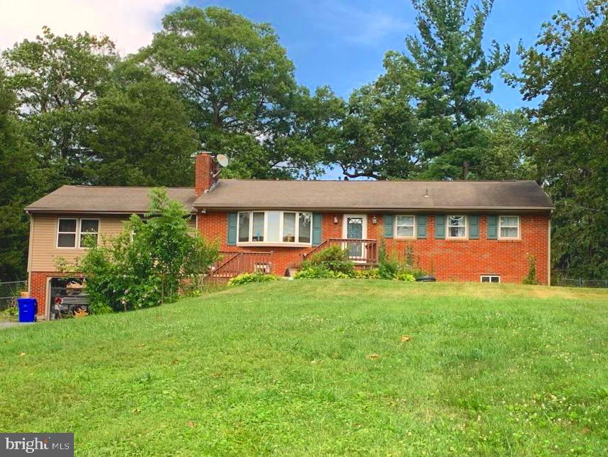 Discover countryside living with this charming 3-bedroom, 2-bathroom home, situated on nearly an acre of land. This property is a perfect retreat from the hustle and bustle of city life, and it is just waiting for you to make it your own!