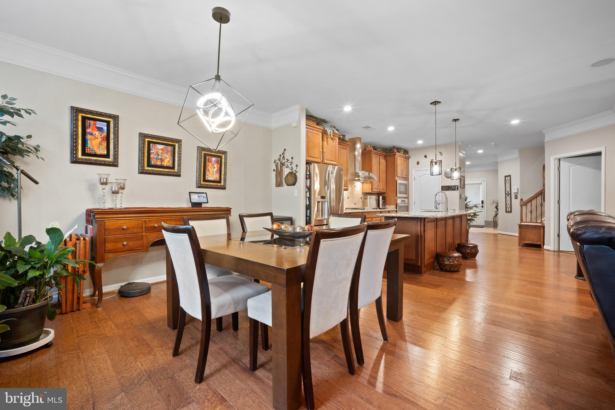Welcome to this stunning Stone Ridge luxury 2 story Villa  nestled right in the heart of Stone Ridge! 
From the moment you step inside, you will instantly feel at ease in this lovely 2,633-square-foot haven. Built in 2014, it is perfectly designed to wrap you in pure comfort while still feeling bright, open, and effortlessly elegant.

ATTENTION BUYERS: CUT YOUR MONTHLY PAYMENT IN HALF! s a rare, 2.5% INTEREST RATE VA ASSUMABLE LOAN  (subject to VA assumption approval). Why pay today's high market interest rates when you can save every month on your mortgage?

The true heart of the home features a cozy fireplace, making the main living area the ultimate spot to unwind after a long day or cuddle up with loved ones. You will love how the open floor plan beautifully connects the living, dining, and kitchen areas, allowing conversations to flow easily whether you are cooking dinner or hosting friends. 

As a wonderful bonus, the main level includes a spacious, bonus room just waiting for your imagination—perfect for a quiet home office, a playful game room, or a creative studio! 

If you're looking for a hideaway the second level boast a loft on the second level in addition to 3 bedrooms! 

If Throughout the home, high-end finishes add a touch of luxury while keeping upkeep to a absolute minimum, giving you more time to simply relax and enjoy life.

Every corner of this property is filled with thoughtful details tailored for modern living. Massive windows flood the rooms with cheerful natural light, creating an airy, uplifting atmosphere that is ready for your personal touch. 

Step outside to discover your own private getaway on the lovely paver patio. Imagine starting your mornings sipping coffee surrounded by peaceful greenery, or hosting relaxed evening gatherings under a canopy of stars.

Getting around is an absolute breeze, too! You are just a stone's throw away from Stone Springs Hospital, fantastic shopping, grocery stores, local restaurants, and the public library. Plus, with commuter lots under 5 miles away and Dulles International Airport less than 10 miles from your door, keeping life moving smoothly is effortless. 

Best of all, you are joining a vibrant, friendly neighborhood with a thriving community spirit. This isn't just a house; it’s a place where your favorite memories will be made. Come see it for yourself—and own your everyday retreat, hurry is waiting for you!