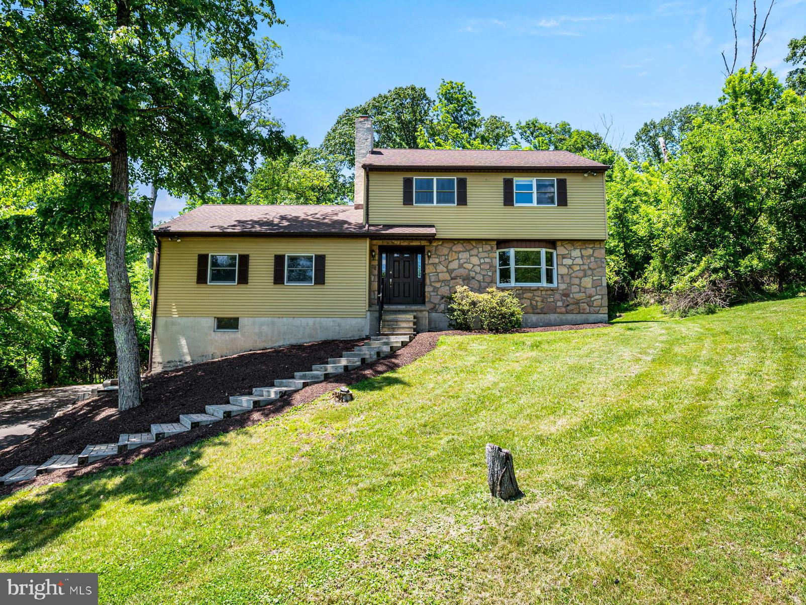 Welcome home to this exceptional property, perfectly situated on a peaceful, private cul-de-sac on 3/4 of an acre. Designed with a thoughtful layout and seamless flow, this residence offers a harmonious blend of daily comfort and effortless entertaining.
Stepping inside, brand-new luxury vinyl flooring stretches across the main level, visually connecting each room. The entryway guides you into a bright formal living room, which transitions naturally into the elegant dining room. From there, the heart of the home awaits in the beautifully remodeled kitchen, complete with pristine newer appliances.  A dedicated laundry room is also tucked discreetly off the main living area for ultimate convenience. The main hallway leads directly into an additional large family room, where a wood fireplace serves as the perfect centerpiece for cozy evenings.
The natural flow continues upstairs, where the private quarters offer a serene retreat. A wide hallway leads to three spacious bedrooms with generous closet space, including a primary suite that features a private full bath with a custom tile shower. The other bedrooms share a pristine hall bath, and a door hidden within the third bedroom's closet offers effortless walk-up access to a massive attic.
Further expanding the home's utility is a deep, clean basement perfect for storage. Beyond the layout, the home boasts 2x6 construction, ample insulation, and dual heat pumps for zoned, energy-efficient climate control. Meticulously maintained and beautifully designed, this one-of-a-kind residence is ready for its next chapter. Seller wants you to feel confident in your purchase and is offering a free one year home warranty!