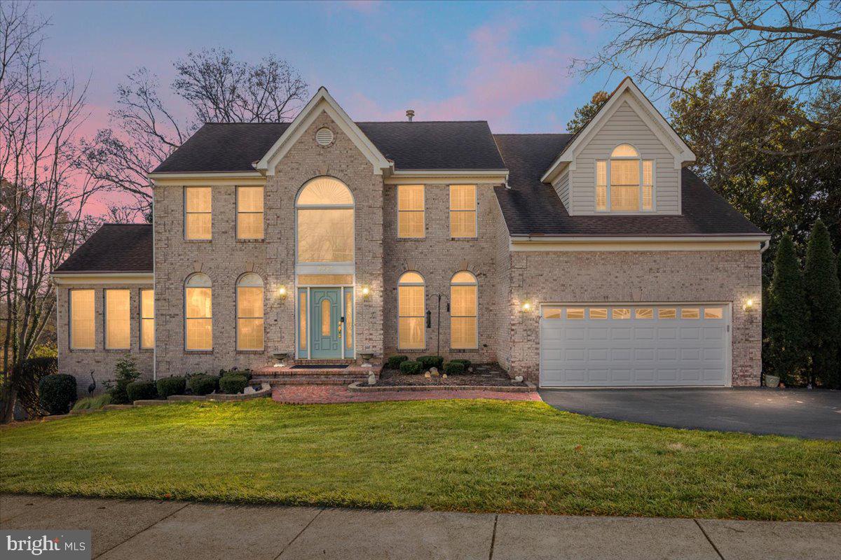 CATERED PANERA BREAD LUNCH OPEN HOUSE SATURDAY 1-3PM! **Multiple Offers in hand and Seller has set an Offer Deadline of Saturday 5:00PM.** Welcome to this gorgeous custom brick-front Colonial situated on a premium .53-acre lot with NO HOA, tucked away in the highly sought-after Madison High School pyramid. Pride of ownership shows inside & out, with over $250,000 in thoughtful, high-quality improvements. Exceptional curb appeal welcomes you with professional landscaping, a timeless brick elevation, and a two-car garage. Inside, a dramatic two-story foyer sets the tone, complemented by gleaming hardwood floors that flow throughout the main & upper floors! The main level offers an ideal blend of elegance and everyday comfort, featuring a private home office, formal living room with chair rail and crown molding, and a formal dining room highlighted by a charming bay window. A stunning sunroom with cathedral ceilings provides the perfect space to relax or entertain year-round. Additional highlights include an updated powder room, dedicated laundry area, and a spacious family room with custom built-ins and a gas brick fireplace. The heart of the home is the fully renovated eat-in kitchen, showcasing white cabinetry with under-cabinet lighting, quartz countertops, a custom backsplash, and premium KitchenAid stainless steel appliances. Both the kitchen and family room provide access to the exceptional deck and screened-in porch, a true outdoor retreat featuring double ceiling fans, modern lighting, tile flooring, metal cable railings for unobstructed views, and a built-in grilling station with a dedicated gas line. Upstairs, the home offers four generously sized bedrooms and two full baths. The primary suite is a standout with vaulted ceilings, chair rail detailing, and three closets. The spa-inspired primary bath, renovated in 2014, features heated floors, a soaking tub, a frameless glass walk-in shower, and double vanity. The walkout lower level is beautifully finished with luxury vinyl plank flooring, recessed lighting, a recreation room, wet bar, electric fireplace, fifth spacious bedroom, and an updated full bath with heated floors—perfect for guests or extended living. Outside, the level, tree-lined backyard offers exceptional privacy and endless possibilities for outdoor enjoyment. The lower deck features a built-in Jacuzzi with pergola and a waterproofed under-deck bar and lounge area, while a storage shed adds convenience for outdoor equipment and tools. Additional highlights include a whole house generator,  NO HOA, *VIENNA WOODS SWIM & Tennis membership*, and a walkable location to Madison High School, Flint Hill Elementary School, and St. Mark's Catholic Church and School. Enjoy easy access to the Town of Vienna, Tysons Corner, Oakton, Vienna Metro, and major commuter routes including Route 123 (Maple Avenue), I-66, Vale, Hunter Mill, and Lawyers Roads. Outstanding location and value. Floor plans, 3D tour, and walkthrough video are available. Schedule your private tour today—homes of this caliber, location, and freedom rarely come available.