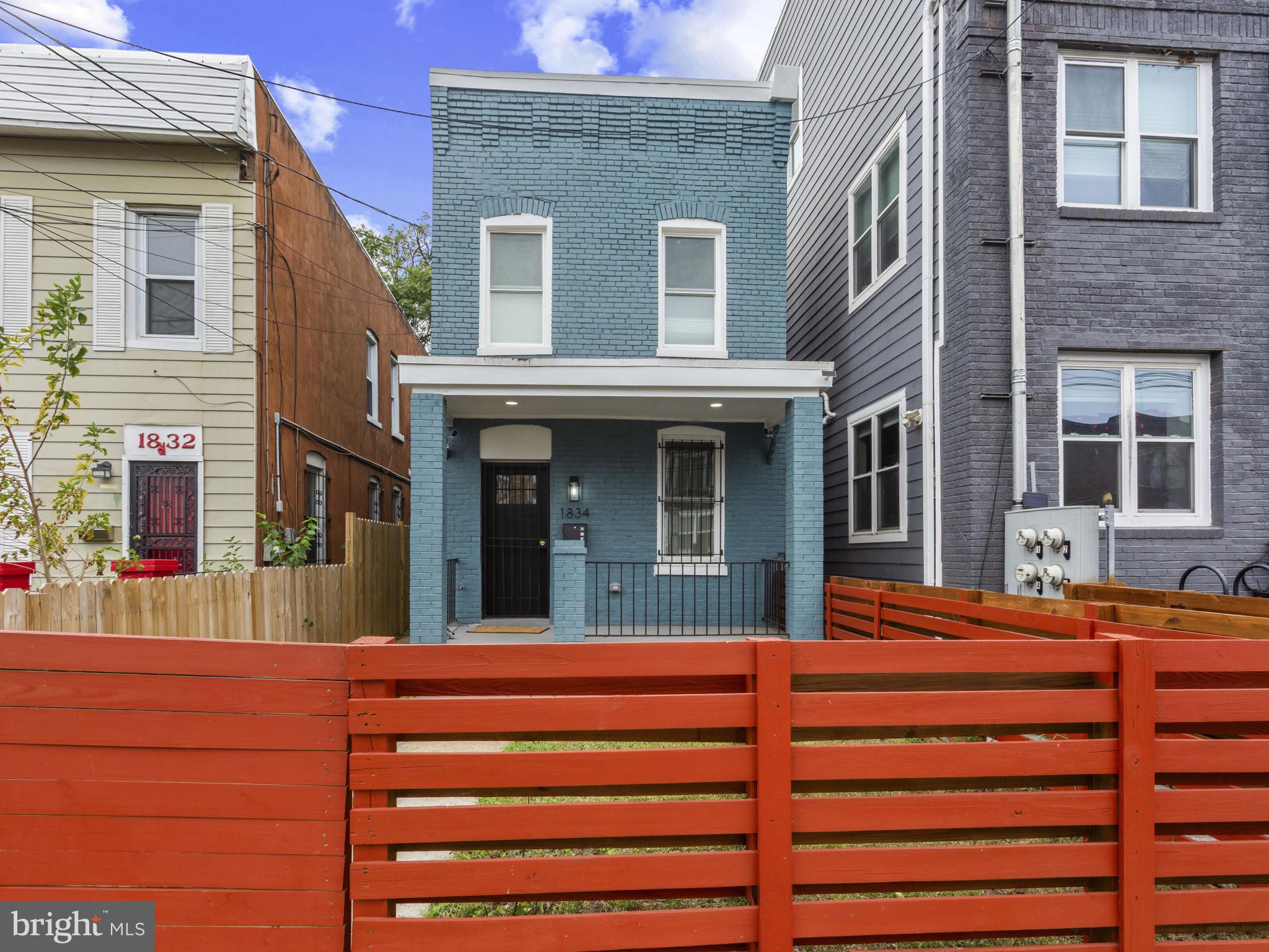 Located at 1834 Providence Street Northeast, Washington, DC, this attractive residential property presents a rare opportunity to own a piece of the city. The property is in great condition and ready to welcome you home. Imagine preparing culinary delights in the kitchen, where stone countertops offer plenty of space for your creations, while shaker cabinets provide stylish storage. With its convenient kitchen bar and beautiful backsplash, this kitchen is a true focal point. The bathrooms offer a spa-like experience, with tiled walk-in showers that promise a refreshing start to your day or a relaxing end to the evening. This two-story home, built in 1900, features a welcoming porch, perfect for enjoying the ambiance of this residential area. The open floor plan creates a sense of spaciousness, while the fenced backyard and deck offer private outdoor living. This property offers two bedrooms and three bathrooms. This residence blends classic charm with modern comfort, creating a truly desirable living space.