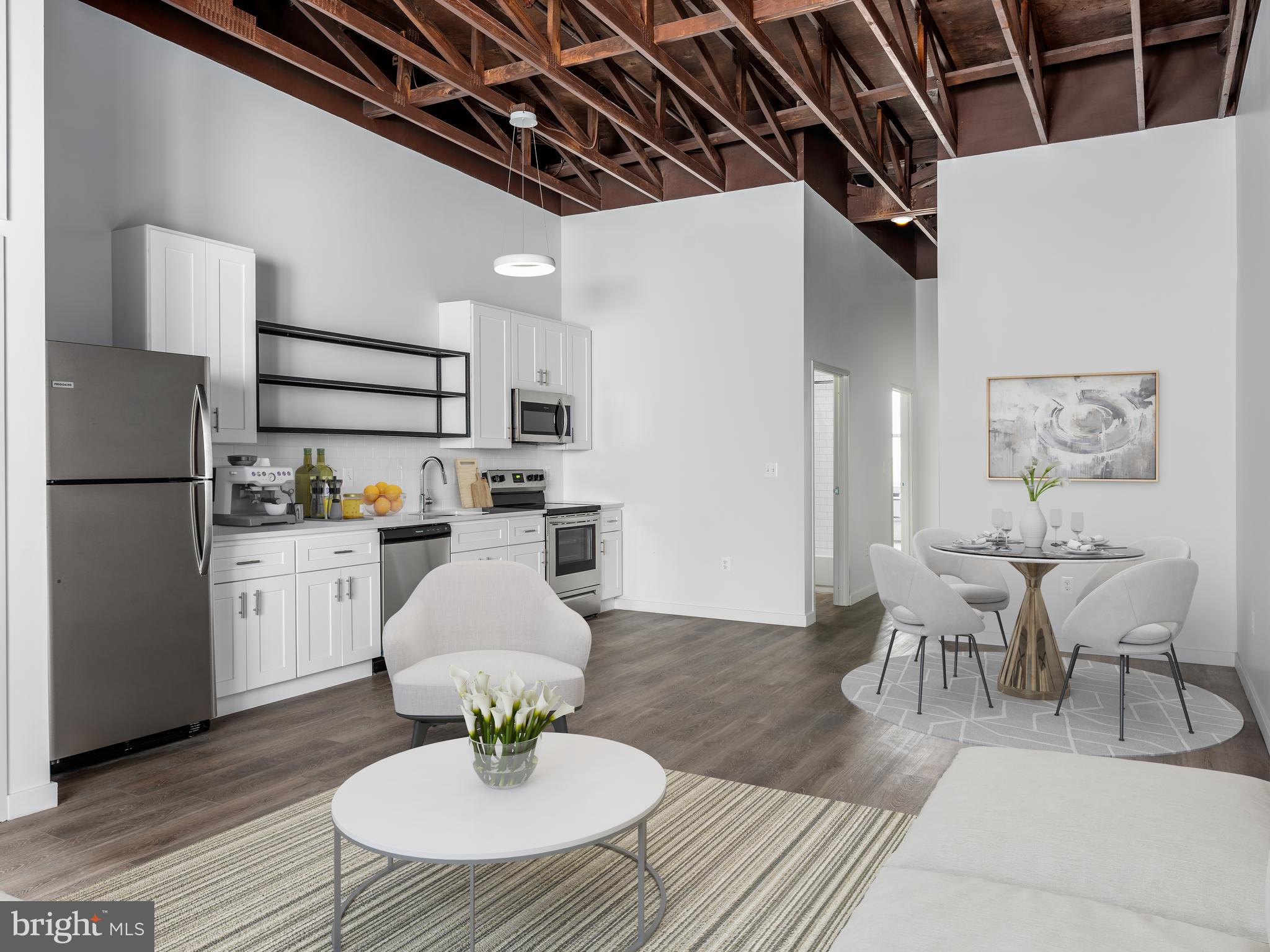 1201 Jackson is a thoughtfully designed community that caters to the wellness of both residents and the environment, The Brush Factory Lofts offer quality interiors, functional amenities, seamless indoor-outdoor spaces, and resource-conscious utilities. Marrying historic character with a modern sensibility, these legacy buildings invite you home to an uncommon urban living experience. Located on 12th and Jackson Streets in South Philadelphia, the Lofts offer residents neighborhood charm, proximity to sought-after destinations, and easy access to nearby transportation. This is the only apartment building of its kind in the area, featuring architectural, design, and lifestyle details that other nearby rentals can t match. This unique character is at the heart of the building s appeal to its residents, who desire to express their own unique individuality in their living space. Unit Amenities include Washer/dryer, Quartz countertops, Hardwood floors, Energy-efficient heating & cooling, massive windows, and unique industrial features such as exposed brick and original building columns. Building Amenities include: Carshare, Bike share, Media Room, Fitness Center, Roof Deck, Parking, Workspace area, Recreation room.

*Photos are of amenities and model units, availability subject to change