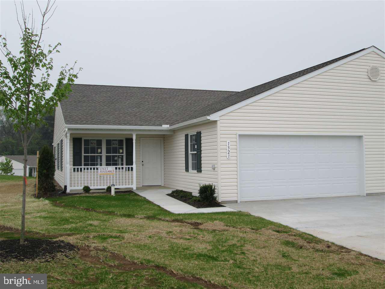 The MANCHESTER - TO BE CONSTRUCTED and can be finished to suit your tastes in this quiet active adult (age 50+) condo community.  LOW monthly fee includes all yard/building maintenance and snow removal! Come pick your interior finishes in this spacious 2-bed and 2-bath floor plan to make it yours!