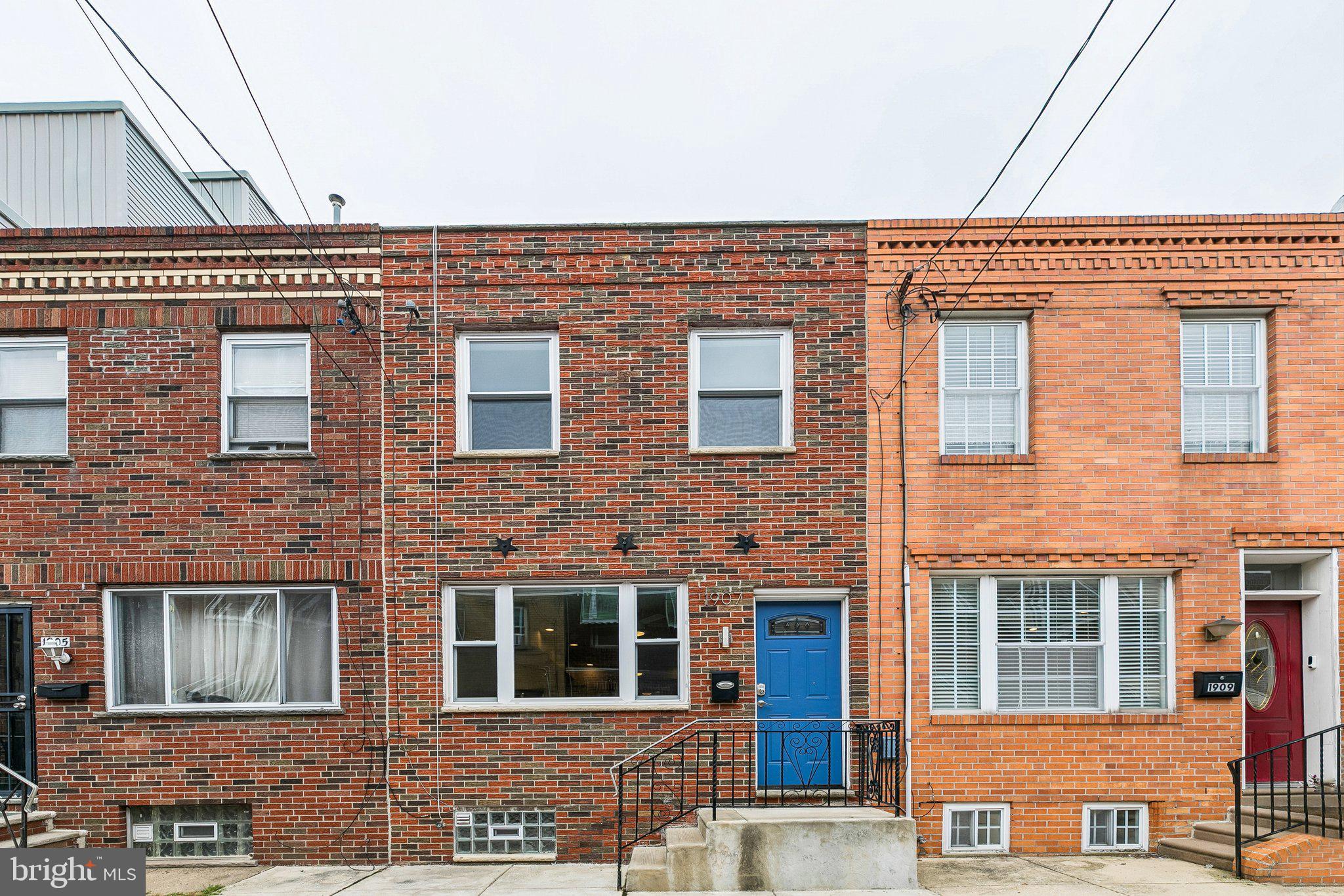 Situated in Passyunk Square, this charming 3-bedroom, 1-bath home offers an ideal blend of classic Philadelphia character and modern comfort. Step inside to find beautiful new hardwood floors flowing throughout a spacious living and dining area, creating the perfect setting for both everyday living and entertaining. The eat-in kitchen provides ample space and features stone countertops, stainless steel appliances, and a tiled backsplash, with direct access to a private rear yard complete with a garden bed—ideal for relaxing or cultivating your own outdoor oasis.  Upstairs, you'll find three comfortable bedrooms, each equipped with ceiling fans, along with a full hall bathroom featuring a tiled tub surround. Additional highlights include efficient radiant heat and central air conditioning.  The full unfinished basement has been professionally waterproofed, side-by-side laundry in the basement, and plumbing for bathroom that offers excellent potential for a future finished space. Located just steps from Passyunk Square's acclaimed restaurants, cafés, boutiques, parks, and public transportation, this home presents an exceptional opportunity to enjoy one of Philadelphia's most sought-after neighborhoods.