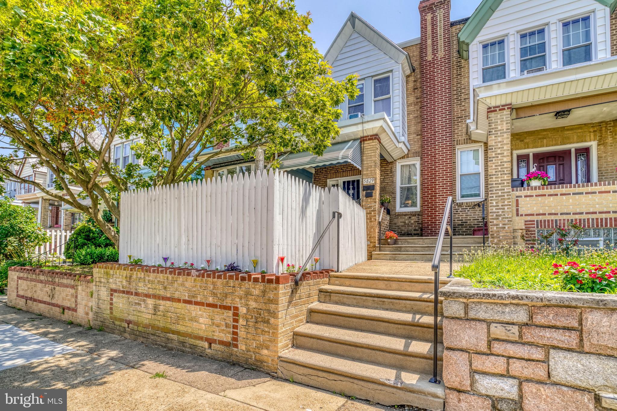 Welcome Home to 5829 N Howard St!  Located in the desirable Olney neighborhood of Philadelphia, this beautifully well-maintained home is a true gem. From the moment you arrive, you’ll be drawn in by the home’s charming curb appeal, complete with a spacious fence in front yard and a covered cemented front porch area—perfect for enjoying sunny days outdoors.  Step inside to discover a warm and inviting living room featuring stylish hardwood flooring, nice ceiling fan with lighting, and neutral paint tones that create a warm and inviting atmosphere and a lovely wall mirror.  The dining room offers plenty of space for family dinners and entertaining guests. This welcoming area features stylish hardwood flooring, decorative wall finishes, and a beautiful chandelier.  The beautiful eat-in kitchen is a showstopper—featuring nice vinyl flooring, nice lighting, sleek cabinetry with plenty of storage, stylish countertops and backsplash, a double stainless-steel sink with modern faucet, and some of the essential appliances including a gas stove & range hood. And a couple of kitchen windows that fills the space with natural lighting, creating a bright and inviting atmosphere to start your day.  Upstairs, the second floor offers a spacious hallway featuring beautifully hardwood flooring and three well-sized bedrooms and a full bathroom. The primary bedroom boasts generous closet space, beautifully hardwood floors, a ceiling fan with light, and soothing paint tones. The middle bedroom offers nice hardwood flooring, ceiling fan with light, and good closet space, while the rear bedroom features hardwood flooring, a nice size closet, and neutral paint colors. There is awesome sized full hall bathroom that is nice and clean that features an awesome light fixture, nice shower/tub area with nice fixtures, nicely tiled flooring, modern vanity & faucets and mirror and an awesome sized toilet.  And a nice skylight to allow some natural sunlight into the bathroom.
The full & finished basement expands your living space with great ceiling height, nice lighting, and a separate laundry area. There’s also a utility room housing the heater and water heater. Whether you envision a fourth bedroom, home office, playroom, or entertainment space, this level offers endless possibilities. A rear exit leads to the spacious driveway area—perfect for parking multiple cars, hosting family gatherings, or simply relaxing outdoors on sunny days.  So, as you can see this his home has clearly been well maintained and is move-in ready. Whether you’re a investor, first-time buyer, or looking to upgrade, it’s a fantastic opportunity. Conveniently located within minutes of Olney shopping center, Roosevelt Blvd, public transportation, shopping, schools, and more.  Why rent when you can own this beautiful home? Don’t wait—schedule your showing today and make 5829 N Howard St your new address Today!