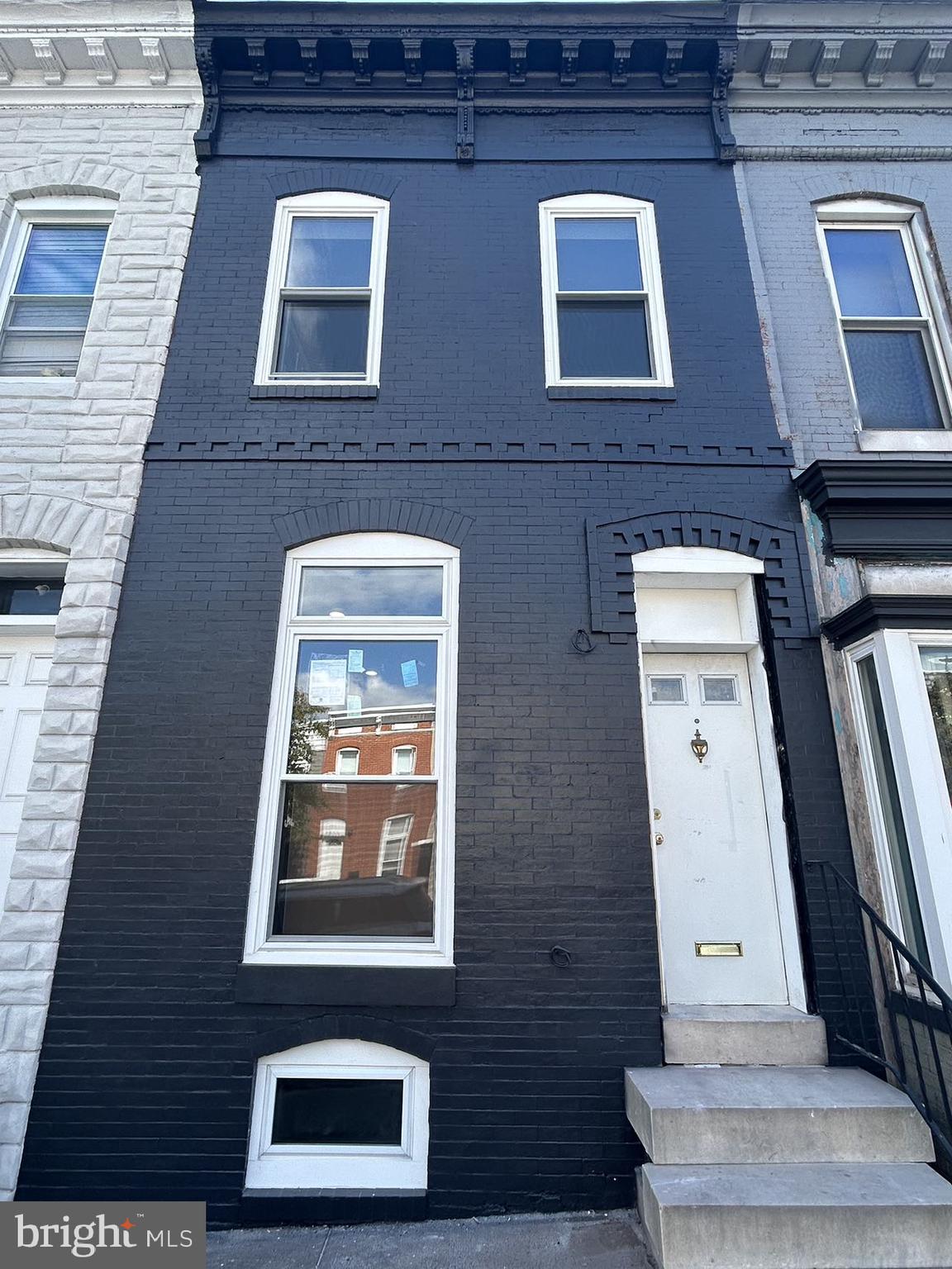 Welcome to this sought after townhouse in Patterson Place. This Charming and spacious 3 bedroom 2.5 bath offers brand new modern renovations to make this a great place to call home. With an open concept layout, plus an oversized living room window that allows for lots of natural light and beautiful and rich Hardwood Floors on the main and 2nd level. Large living room connects to an open kitchen and attached dining room with half-bath for guests and outdoor patio. This renovated kitchen has a center island, granite countertops, light wood cabinets, built in microwave and stainless-steel appliances. The upper level offers a master bedroom , two additional bedrooms and a bathroom. Each of the baths are beautifully finished. The unfinished basement area provides plenty of additional storage space . Conveniently located to John Hopkins and Patterson Park and all the other amenities that come with downtown living.