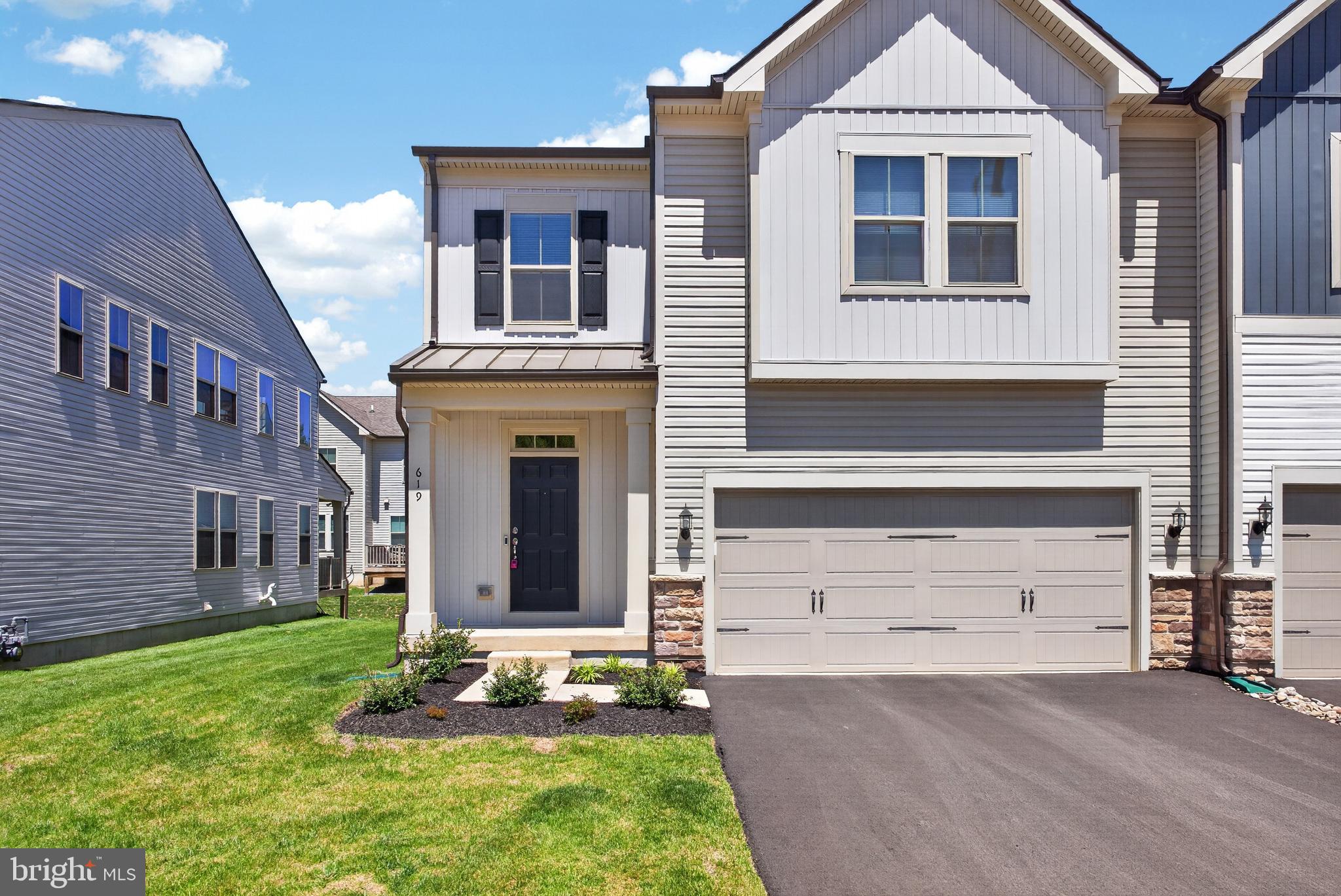 Welcome to luxury living in the highly sought-after Liberty Ridge community! This stunning 3-bedroom, 3.5-bath luxury townhome offers modern finishes, spacious living areas, and thoughtful design throughout.
Step onto the covered front porch and enter through the welcoming foyer featuring a coat closet and convenient powder room. The open-concept main level is filled with natural light and offers a spacious living room, cozy family room, and an oversized dining area perfect for entertaining or everyday living. The beautifully appointed kitchen features 42-inch cabinets, quartz countertops, high-end stainless steel appliances, and a large walk-in pantry providing exceptional storage space. Sliders lead to the rear deck, creating the perfect indoor-outdoor flow.
The huge finished basement expands your living space with plush carpeting, recessed lighting, and its own full bathroom — ideal for a media room, guest suite, home gym, or office.
Upstairs, the luxurious primary suite features modern lighting, private access to the upper-level deck, two large walk-in closets, and a stunning primary bathroom complete with dual vanities and upscale finishes. Two additional spacious bedrooms each include ceiling fans and walk-in closets. A full hall bath and convenient upper-level laundry room complete the second floor.
This exceptional home combines space, style, and modern comfort in one of the area’s most desirable communities.