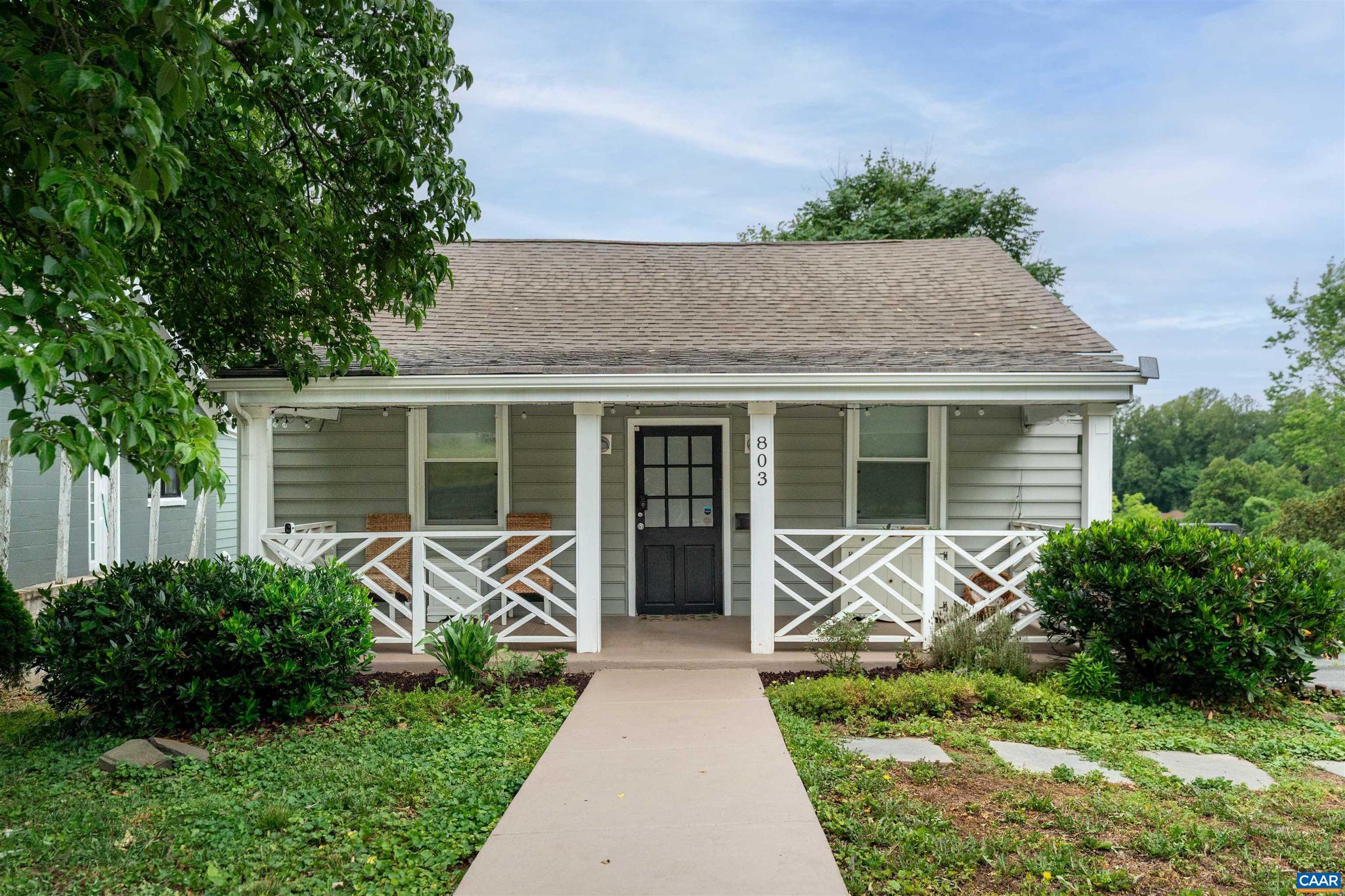 Welcome home to this charming and beautifully updated cottage nestled in the heart of Charlottesville. Offering the perfect blend of historic character and modern convenience, this 2-bedroom, 1-bath home is ideally located just minutes and easily walkable to UVA Hospital, UVA, the Historic Downtown Mall, local parks, along with easy access to Wegmans and 5th Street Station! From the moment you arrive, you'll be drawn to the inviting front porch?a wonderful place to enjoy your morning coffee or relax at the end of the day. Inside...beautiful hardwood floors, abundant natural light, and thoughtful updates create a home that feels both timeless and welcoming. The bright eat-in kitchen features granite countertops, stainless steel appliances, a stylish tile backsplash, & plenty of space for everyday living and entertaining...along with a convenient first-floor bedroom & full bath. The walkout basement offers a 2nd bedroom, office, or recreation space, along with valuable storage space & laundry area.  Enjoy the elevated deck, overlooking the fully fenced backyard, ideal for pets, gardening, or entertaining. Off-street parking in the private driveway completes this move-in-ready gem near everything Charlottesville has to offer!,Granite Counter,White Cabinets