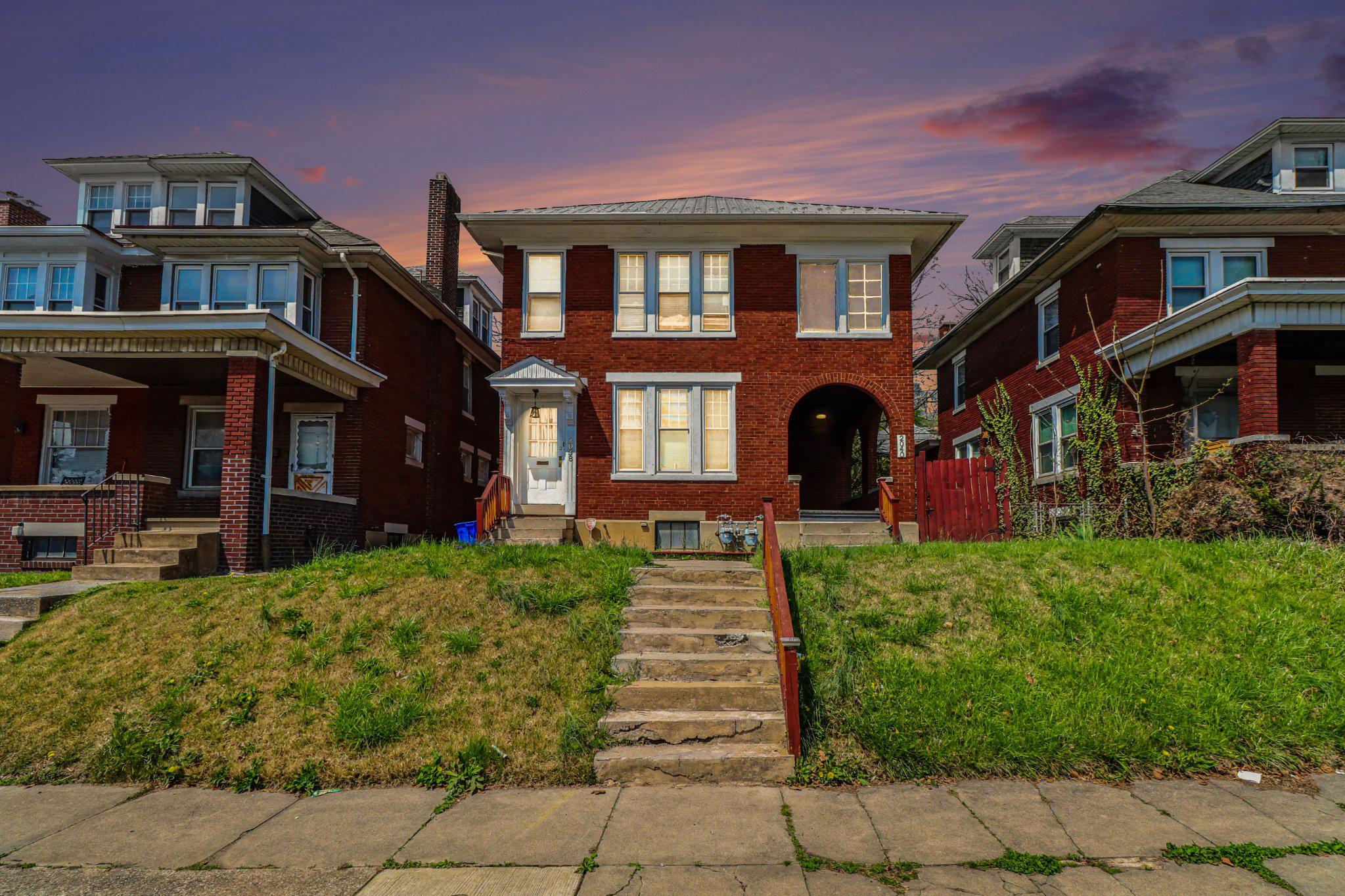 Well-maintained duplex featuring two 2-bedroom units, both currently rented, offering immediate income. Unit 2038 (2nd floor) rents for $1,200/month and includes private entrance, sunroom, spacious living room with brick fireplace, formal dining room, and large primary bedroom. Unit 2040 rents for $1,100/month and offers a 2-bedroom layout with beautiful floors, fireplace and front porch & rear deck. Landlord pays water, sewer, and trash. Owner financing available. Property being sold AS-IS.
