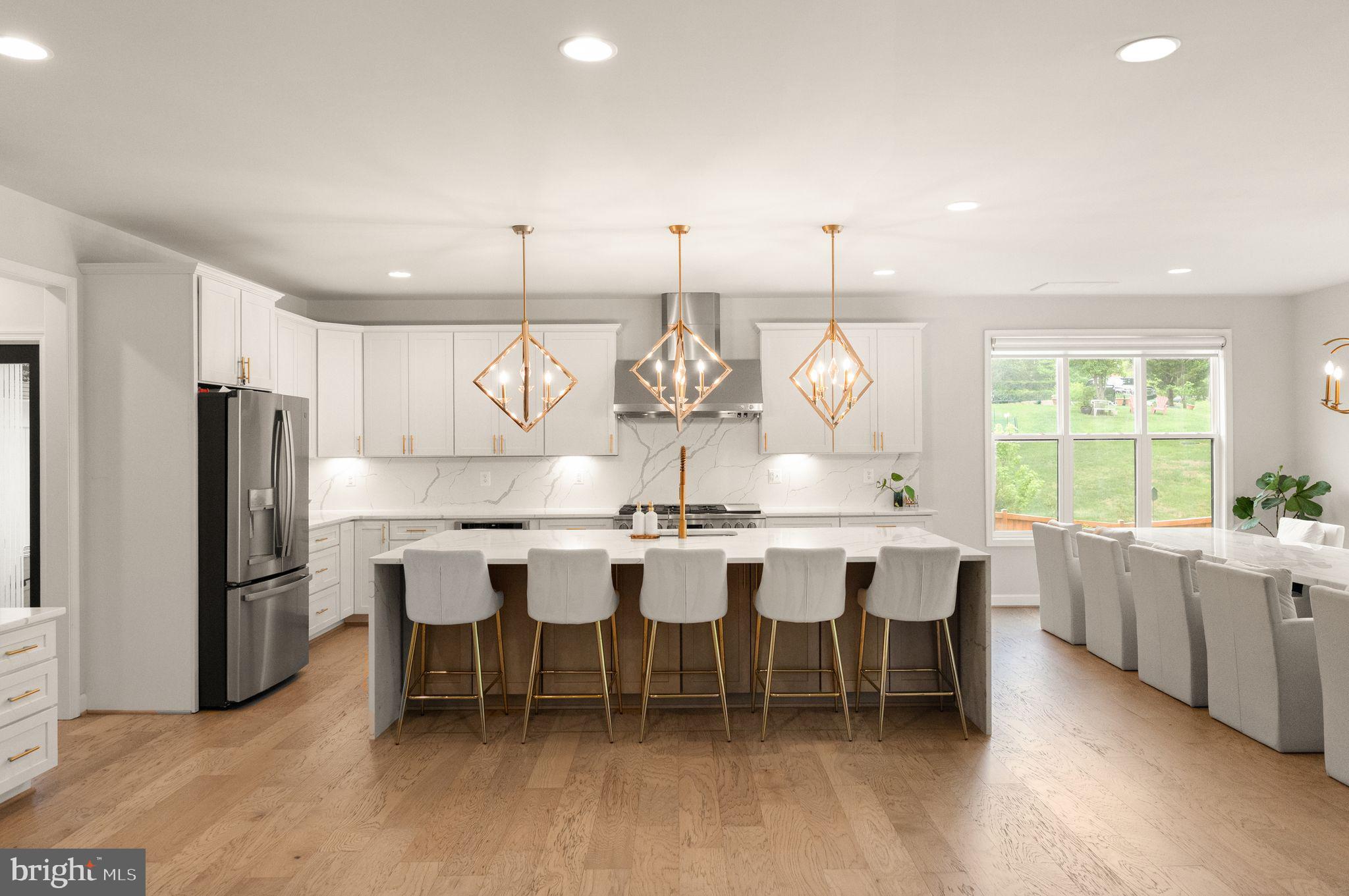 Step into a turn-key executive retreat, masterfully crafted 2023 sanctuary where luxury is defined by performance. Enjoy the peace of mind that comes with integrated high-performing solar energy and a whole-house water filtration system, rare high-value assets that set this home apart. With dual primary suites and a gourmet chef’s kitchen, every inch of this 5,600 sq. ft. estate is designed for excellence. Pure Luxury on 1.14 Secluded Acres
This masterfully crafted 2023 custom estate delivers the ultimate sanctuary. Avoid the compromises of older, dated lots and enjoy turn-key sophistication just 12 minutes from historic downtown Clifton and an easy commute to Tysons Corner and DC.

 Spanning a massive 5600 heated sq ft layout across 6 spacious bedrooms (each with a dedicated full bath), this home was specifically designed to balance vibrant entertaining with absolute privacy. The floor plan boasts dual master suites, one occupying a pristine footprint on the main level and the other an airy, dramatic loft that grants breathtaking scale to the open floor plan.

The main living area features a grand two-story foyer, a chef-inspired kitchen built for large-scale hosting, and sweeping sightlines to a vast, private backyard canvas.

While the main levels are fully complete and impeccably finished, the sprawling walk-out lower level offers a massive head start. All foundational electrical, kitchen, and full-bath rough-ins are already expertly installed. Skip the heavy demolition and permitting hurdles and instantly bring your vision of a private wellness gym, soundproof media room, or custom wet bar to life.

Experience elevated living with a home designed for both luxury and performance. This exceptional property seamlessly blends elegance with cutting-edge efficiency, featuring high-performing solar panels that significantly reduce energy costs while supporting a more sustainable lifestyle.

Enjoy pristine, crystal-clear water throughout the home thanks to a premium, whole-house water filtration system, delivering both peace of mind and refined comfort in every drop. Outdoors, the professionally installed in-ground lawn sprinkler system keeps the meticulously landscaped grounds lush, green, and effortlessly maintained year-round.

Every detail of this estate has been thoughtfully curated to enhance convenience, efficiency, and upscale living, offering a rare opportunity to own a home where modern innovation meets timeless luxury. Don's miss this remarkable find and rare opportunity. Showings by appointment only.
