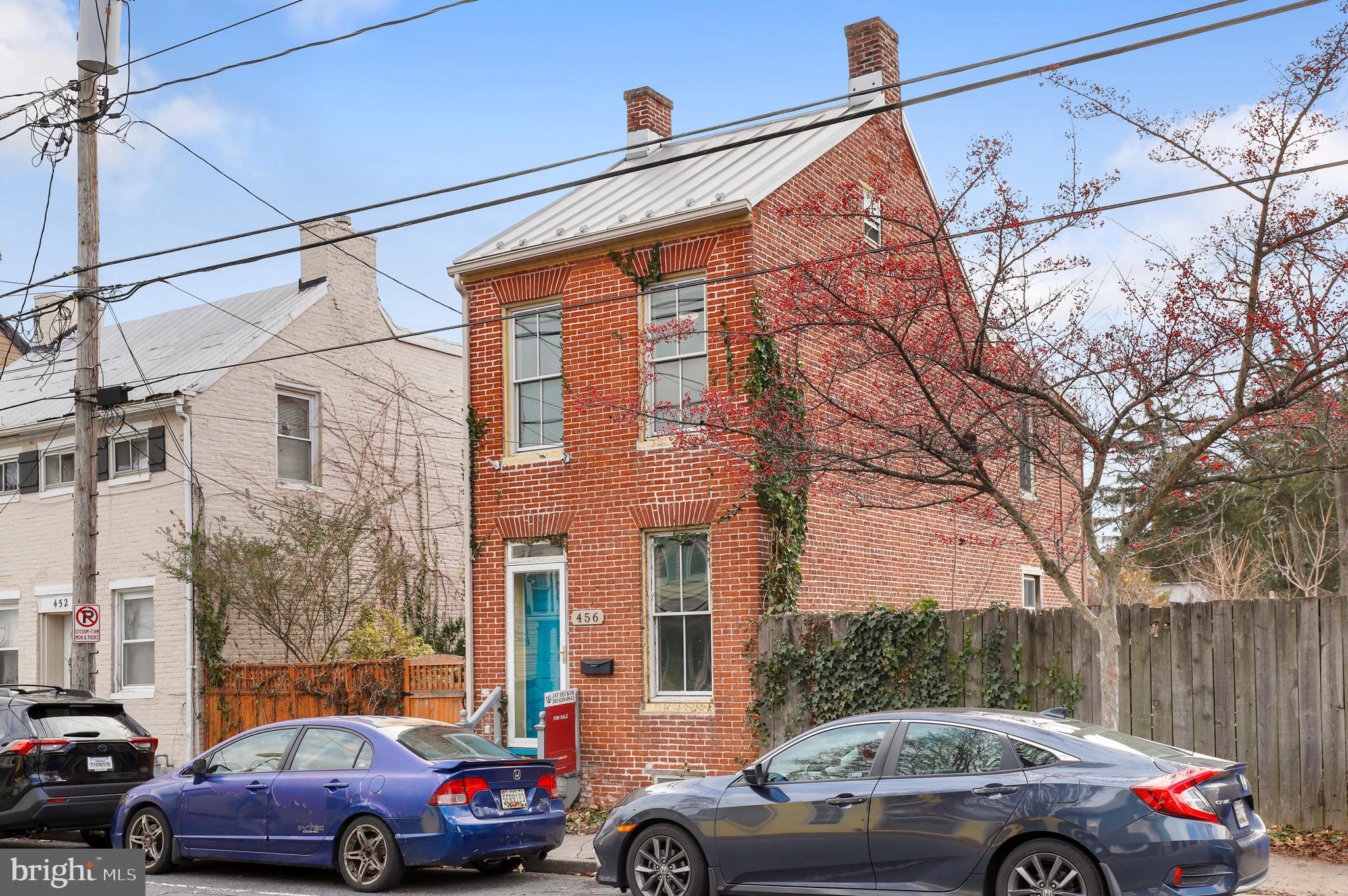 Great Frederick City Historic District  brick and frame detached row home with off street parking (via Hoffmans Alley off of Madison Street).  3 BR 2.5 baths with central A/C.  Updated kitchen with stainless steel appliances and granite counter tops.  Main level laundry hook ups.  Newer standing seam metal roof, newer HVAC and Hot Water Heater.  Updated electric panel.  Walk to the fun zone of of  downtown Frederick  with all of its' restaurants, taverns and shops.  A short walk to Mullinex and Baker Parks.  See this one before it is gone.