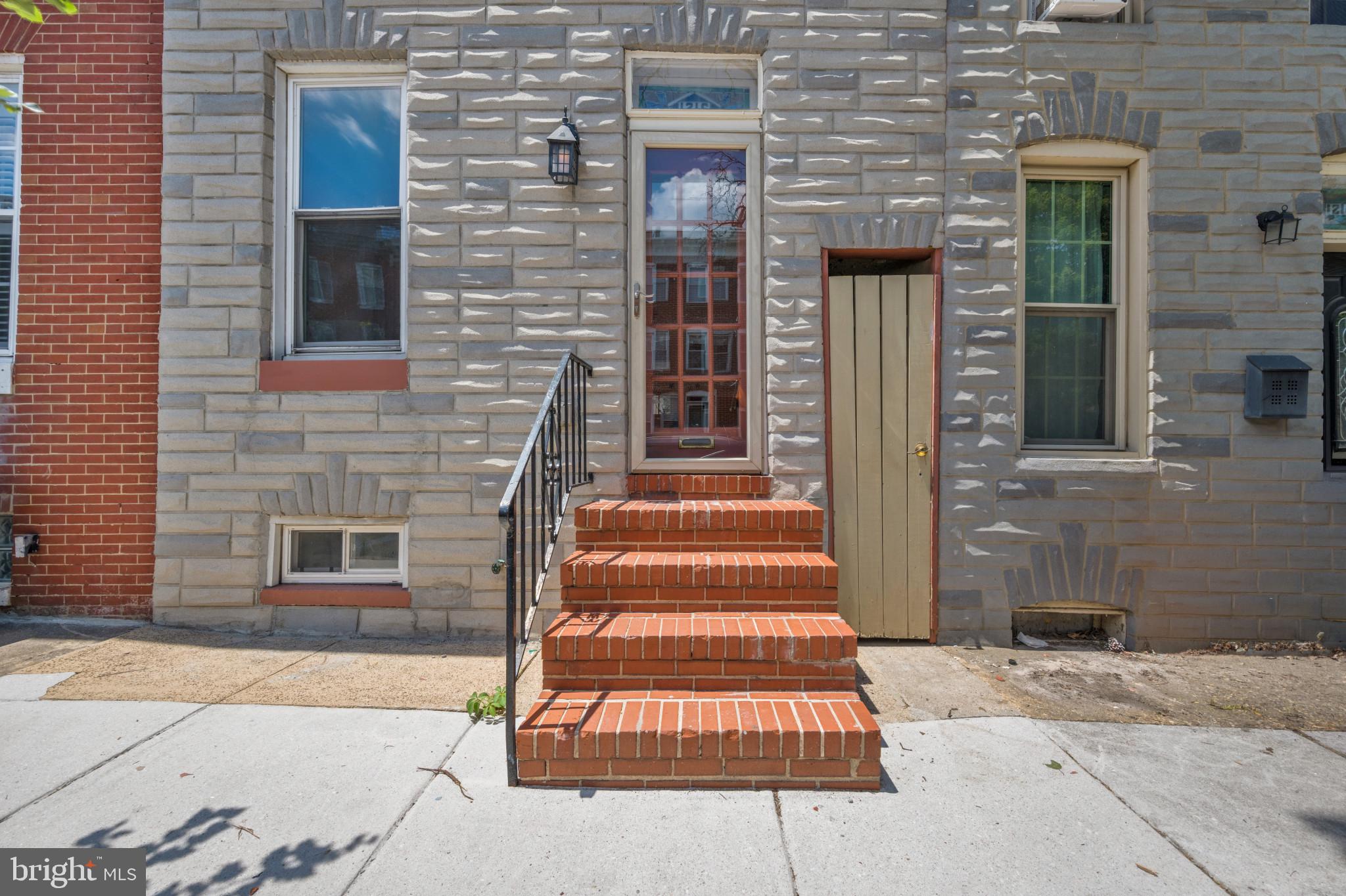 Charming 2-bedroom, 2-bath home in the heart of Historic Federal Hill, offering the perfect blend of character and city convenience. Beautiful hardwood floors flow throughout the main living areas. The kitchen features stainless steel appliances and provides easy access to the finished rear deck, creating the perfect space for outdoor dining, entertaining, or simply relaxing. The upper level features a spacious bedroom, full bath, and a versatile bonus room ideal for a home office or a den. The finished lower level offers a private bedroom and full bath, making it perfect for guests, roommates, or additional living space. A rare city amenity, this property includes a 1-car garage plus room for additional off-street parking space behind the garage, potentially providing parking for two vehicles. Ideally located just blocks from Cross Street Market, Federal Hill Park, the Inner Harbor, and an abundance of restaurants, shops, and entertainment, this home offers the best of city living in one of Baltimore's most desirable neighborhoods.