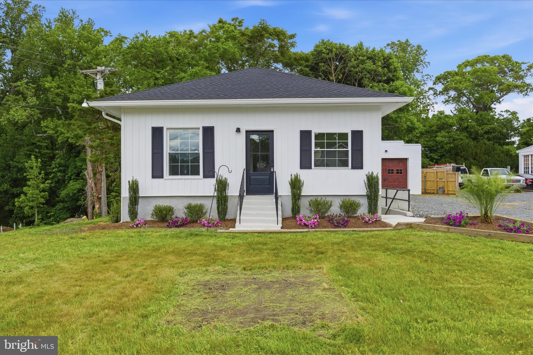 Perfectly positioned in the heart of Prince Frederick, this thoughtfully renovated home blends timeless charm with modern refinement... Renovated from top to bottom, every detail has been carefully curated to create a move-in ready property with both comfort and functionality in mind... Inside, you’ll find updated flooring throughout, a beautifully refreshed kitchen, and stylishly renovated bathrooms designed for everyday living... Major improvements, including a new roof, windows, and insulation, provide peace of mind for years to come... Offering 3 bedrooms and 2 full bathrooms, the home also features a versatile bonus room ideal for a home office, guest space, or potential fourth bedroom... The fully finished basement with private access offers additional flexibility for multi-generational living, recreation, or a private work-from-home setup... An attached oversized garage offers abundant storage and convenience, while custom landscaping ties the entire property together with exceptional curb appeal... Conveniently located near shopping, dining, schools, and commuter routes, this beautifully updated property offers the perfect combination of style, space, and location in sought-after Prince Frederick.