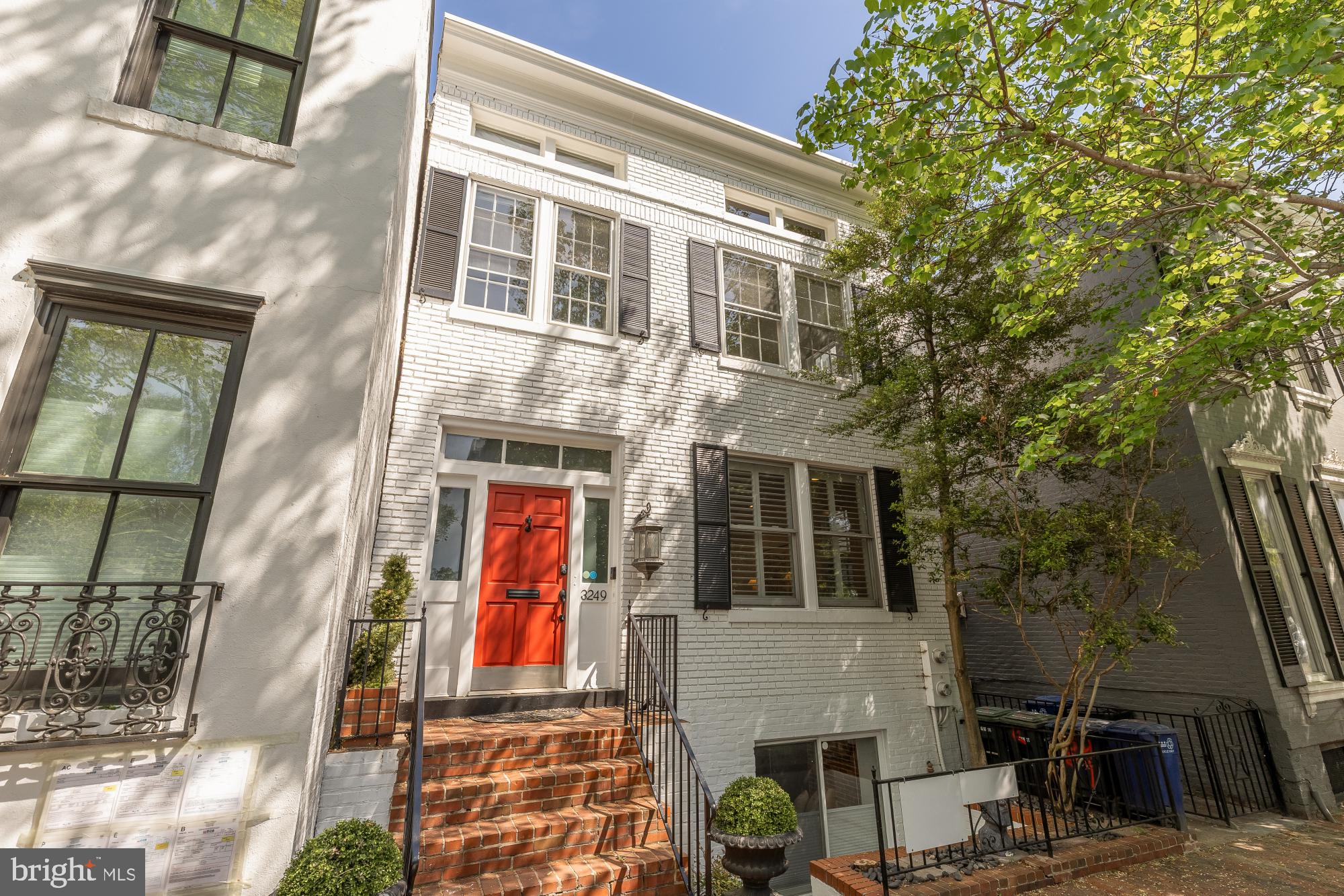 Open House this weekend!  Stop by the the storied enclave of Georgetown — where cobblestone streets meet centuries of American history — 3249 P Street NW stands as a rare and considered residence, one that honors the architectural soul of the neighborhood while embracing every expectation of contemporary luxury.
Thoughtfully refined over the years, the home reflects a continued commitment to quality — pool is newly painted  and ready for summer, a new roof, main floor HVAC system is 1 year old, and beautifully upgraded floors among the most notable improvements. Each update has been made with care and intention, preserving the home’s historic character while elevating every dimension of modern comfort.
At the heart of the residence, the chef’s kitchen is a study in quiet sophistication — integrated Miele appliances, bespoke cabinetry, and an open, luminous layout conceived for the art of entertaining. The principal living room, anchored by an elegant fireplace, offers warmth and proportion in equal measure, its atmosphere flowing naturally toward the home’s most private sanctuary: a walled rear patio and 16x14 pool framed by mature greenery and aged brick. This sequestered garden retreat — rare in its scale and serenity for the city — invites long summer evenings and unhurried weekend mornings with the ease of a countryside estate.
Above, soaring ceilings and a generous array of skylights and south-facing windows bathe the upper level in extraordinary natural light. The primary suite is a study in restorative calm, appointed with a spa-caliber bath of high-end fixtures, hand-selected tile work, and finishes chosen with the discerning eye of a designer who understands that true luxury is personal. A bespoke steam shower completes the experience — an unhurried ritual of restoration that transforms the morning routine into something altogether more considered.
A separately metered lower level extends the home’s versatility further still — an ideal canvas for a distinguished guest suite, private study, or income-generating residence.
To live at 3249 P Street NW is to inhabit one of Washington’s most coveted addresses at its fullest expression. The boutiques and celebrated tables of M Street and Wisconsin Avenue — among them Café Milano, Martin’s Tavern, and Kafe Leopold — are mere steps away, as are the C&O Canal Towpath and Georgetown Waterfront Park, where the Potomac’s edge offers a rare counterpoint of natural beauty within the city’s most dynamic quarter.
This is not simply a home. It is a standard of living.​​​​​​​​​​​​​​​​