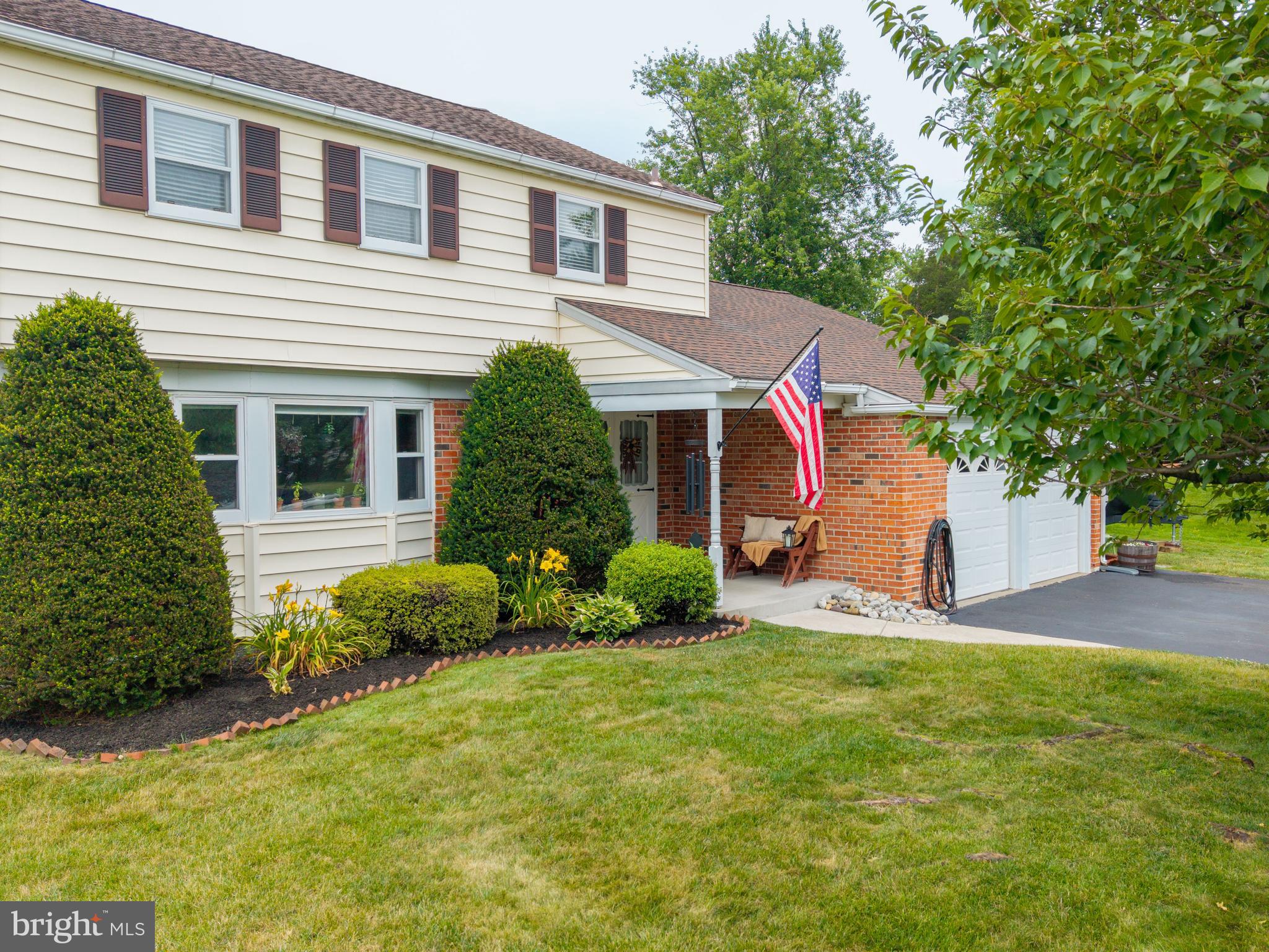 Located on one of Harleysville's most coveted streets, this updated 4-bedroom, 2.5-bath Colonial truly has it all. Exceptional curb appeal, mature landscaping, a two-car garage with attic storage, an expanded driveway, and one of the largest lots in the neighborhood—just shy of an acre—set the stage for this beautifully maintained property. Lovingly cared for both inside and out, the current owners purchased this home as their forever home and are only relocating due to an unexpected family opportunity. Now it's your chance to make it yours!
Step inside and you'll immediately appreciate the inviting neutral palette, gleaming hardwood floors, upgraded interior doors, and tasteful modern updates throughout. The spacious formal living and dining rooms offer the perfect setting for everyday living as well as larger gatherings.
The kitchen is thoughtfully designed with natural gas cooking, granite countertops, under-cabinet lighting, stainless steel appliances, a full pantry, an intercom system, and a generous breakfast area overlooking the backyard. Open to the kitchen, the family room is another standout feature, boasting vaulted ceilings with exposed wood beams, recessed lighting, a Pella sliding door with built-in blinds, and a beautiful fireplace enhanced by a professionally installed wood-burning insert. A conveniently located powder room and laundry room, complete with luxury vinyl plank flooring, garage access, and an exterior side entrance, complete the main level.
Upstairs, hardwood flooring continues throughout. The spacious primary suite easily accommodates large furniture, offers two closets, and features access to the updated en-suite bathroom. Three additional bedrooms are generously sized and share a beautifully updated hall bathroom with dual vanities and a tub/shower combination with glass doors.
Before heading outside, don't overlook the attached two-car garage. The current owners transformed it into a comfortable, multi-purpose space with durable epoxy-coated floors, stylish dark paint, and a new mini-split heating and cooling system. Whether used for parking, hobbies, or a home gym, it's a valuable extension of the home (home gym equipment not included). Both garage doors are equipped with automatic openers, and an overhead loft, accessed by pull-down attic stairs, provides additional storage.
Step outside through the family room slider onto the hardscape paver patio and enjoy the peaceful backyard setting. A French drain system, installed by the original owner to direct rainwater away from the home, has functioned exactly as intended, contributing to the home's exceptionally dry basement. A storage shed provides convenient space for lawn equipment and outdoor essentials, while a fire pit offers the perfect place to gather on cool evenings. The above-ground pool and children's playset will be removed before settlement. With nearly an acre of land, the backyard offers endless possibilities for recreation, gardening, or future enhancements.
A full unfinished basement provides abundant storage today and excellent potential for future finished living space.
A few notable features and upgrades include a sump pump basin with a Water Commander backup system and electrical discharge, an upgraded electrical panel, a temperature-controlled attic fan, natural gas three-zone heating, central air conditioning, and programmable thermostats.
Enjoy all the benefits of an established Souderton School District neighborhood while being just minutes from major commuter routes, shopping, dining, parks and everyday conveniences!  Showings can be scheduled beginning Sunday 7/12 at 1PM.  Thank you!