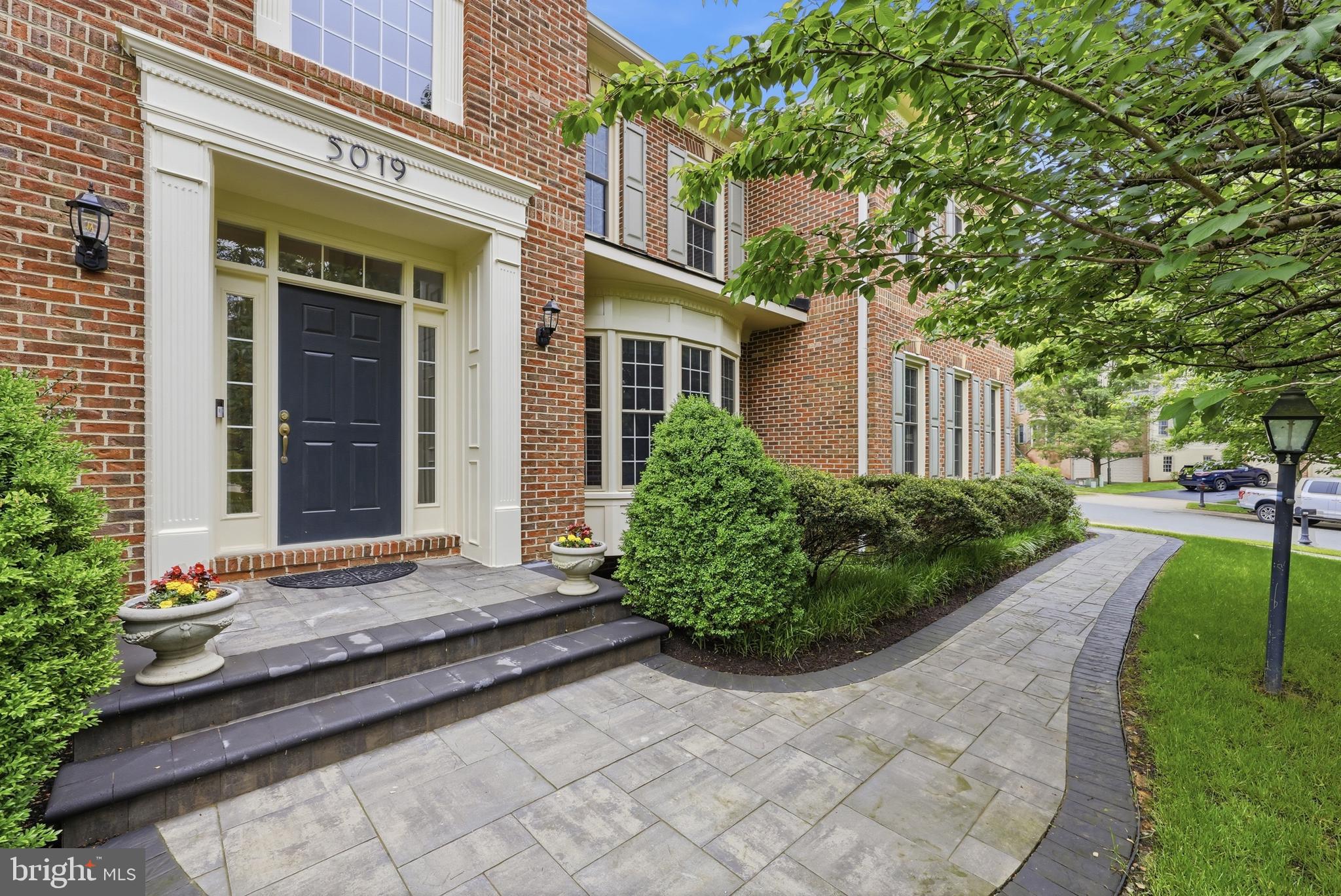 Nestled in a quiet peaceful section of one of the premier neighborhoods within Olney.  This light filled, spacious home offers comfort, style and an ideal floor plan designed for modern living.  You're welcomed into the home by a two-story foyer and newly finished LVP flooring that flows into the main living areas.  To the left of the entrance, is comfortably sized formal living and dining rooms.  The heart of the home is the large family room anchored by a cozy wood burning fireplace and a stunning wall of windows that frame the room beautifully.  Additionally, all original windows have been replaced with low-maintenance, vinyl-clad windows—eliminating the need to ever paint wood frames again.  Adjacent to the family room is a generously sized Kitchen which has updated the cabinets, quartz countertops and a large center island with space for seating.  With abundant cabinetry, a large pantry and plenty of space for a dining table.  With a doorway that leads to the dining room and on the other side of the kitchen, sliding doors that take you to a wonderfully hardscaped patio with a lovely, fenced, backyard.  Also on the Main level, you'll find a Powder Room, Office, and Laundry/Mud room that leads to an oversized garage for 2 cars, with an epoxy finish floor and separate exit door. A custom four-foot bump-out adds valuable extra space to both the garage and the primary suite above.  Upstairs the  generous primary suite features a cathedral ceiling and ample space for a sitting area.  With two walk-in closets and a bright airy ensuite with soaking tub, dual vanities, separate shower and a dressing area just outside the doorway.  The upper level also includes a second suite with its own private bath and two additional bedrooms that share a Jack-and-Jill Bathroom.   All bedrooms in this home feature walk in closets.  The massive lower level is a blank canvas ready for your personal touch, featuring a rough-in for a full bath, a walk-up exit to the backyard, and ample storage space.  Recent updates include Walkway to the front door, LVP Flooring, Freshly Painted,  Kitchen and Bathrooms updates.  Enjoy all the fantastic amenities Barnsley Manor has to offer, including walking paths, tot lot, tennis & pickleball, basketball courts, neighborhood-sponsored events, and a community pool. All of this is located just minutes from the Town of Olney’s shopping & dining, plus public & private schools are a short drive away.  This is an exceptional opportunity and an absolute MUST-SEE!
