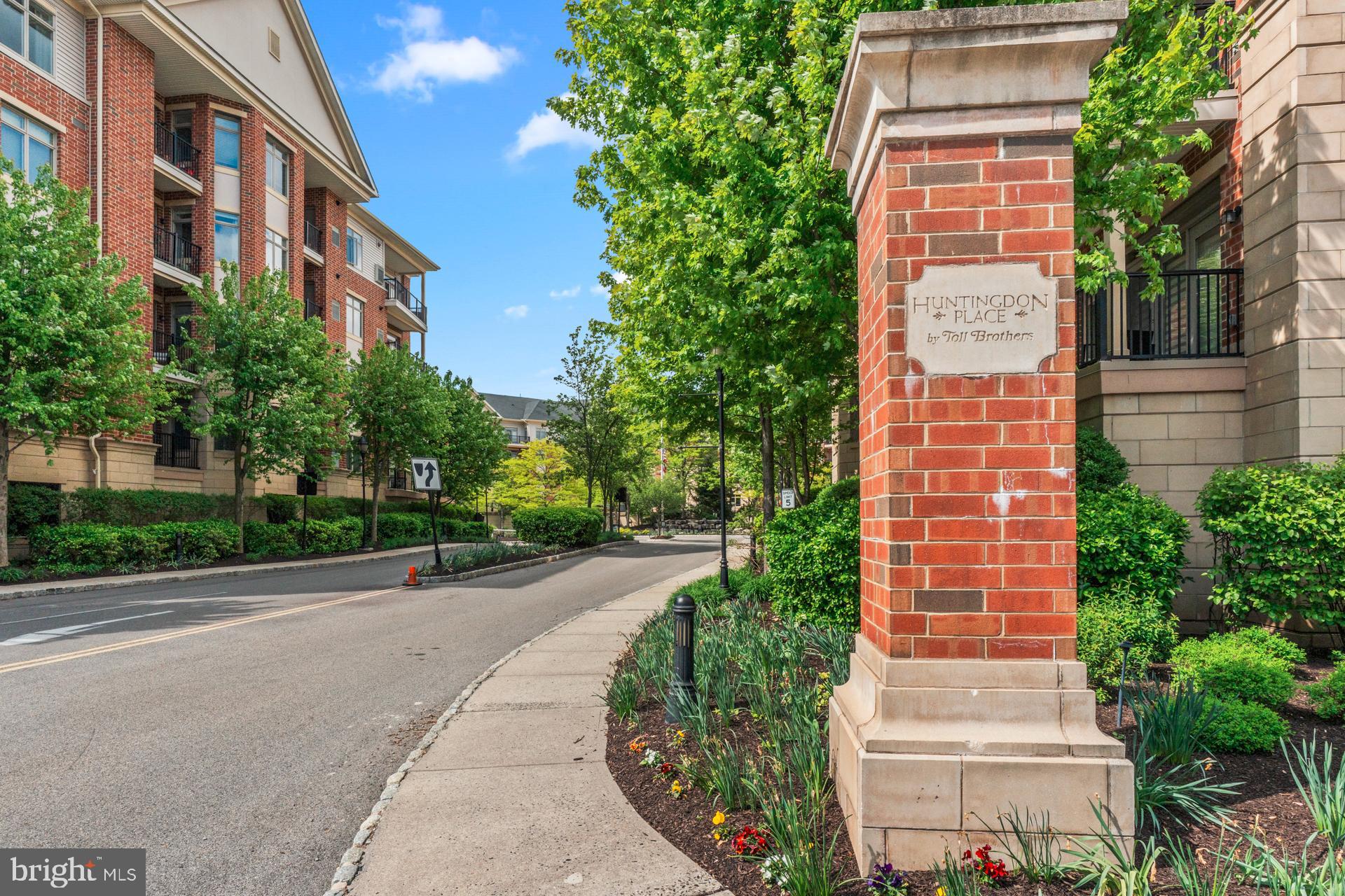Immaculate and completely move-in ready, this stunning 2-bedroom, 2-bath “Whitehall” model offers luxury, comfort, and low-maintenance living in the highly sought-after Huntingdon Place community within the Blue Ribbon Lower Moreland School District. Filled with natural sunlight and thoughtfully designed throughout, this spacious unit features an open and inviting layout perfect for both everyday living and entertaining.

The oversized gourmet kitchen is a standout feature, boasting granite countertops, 42” cabinetry, recently upgraded appliances, recessed lighting, and a separate eat-in area ideal for casual dining. The expansive living and dining areas flow beautifully and open to a private balcony, creating the perfect extension of the living space.

Offering exceptional versatility, the floorplan also includes a dedicated office, den, and two generously sized bedroom suites positioned privately off the main living area. The luxurious primary suite features an enormous walk-in closet, while the laundry area includes a full-size washer and dryer for added convenience.

Enjoy resort-style amenities including a 24-hour lobby attendant, state-of-the-art fitness center, indoor exercise pool, resident lounges, and community room. This pet-friendly unit also includes two deeded parking spaces and provides the perfect combination of elegance, convenience, and carefree living in an unbeatable location.