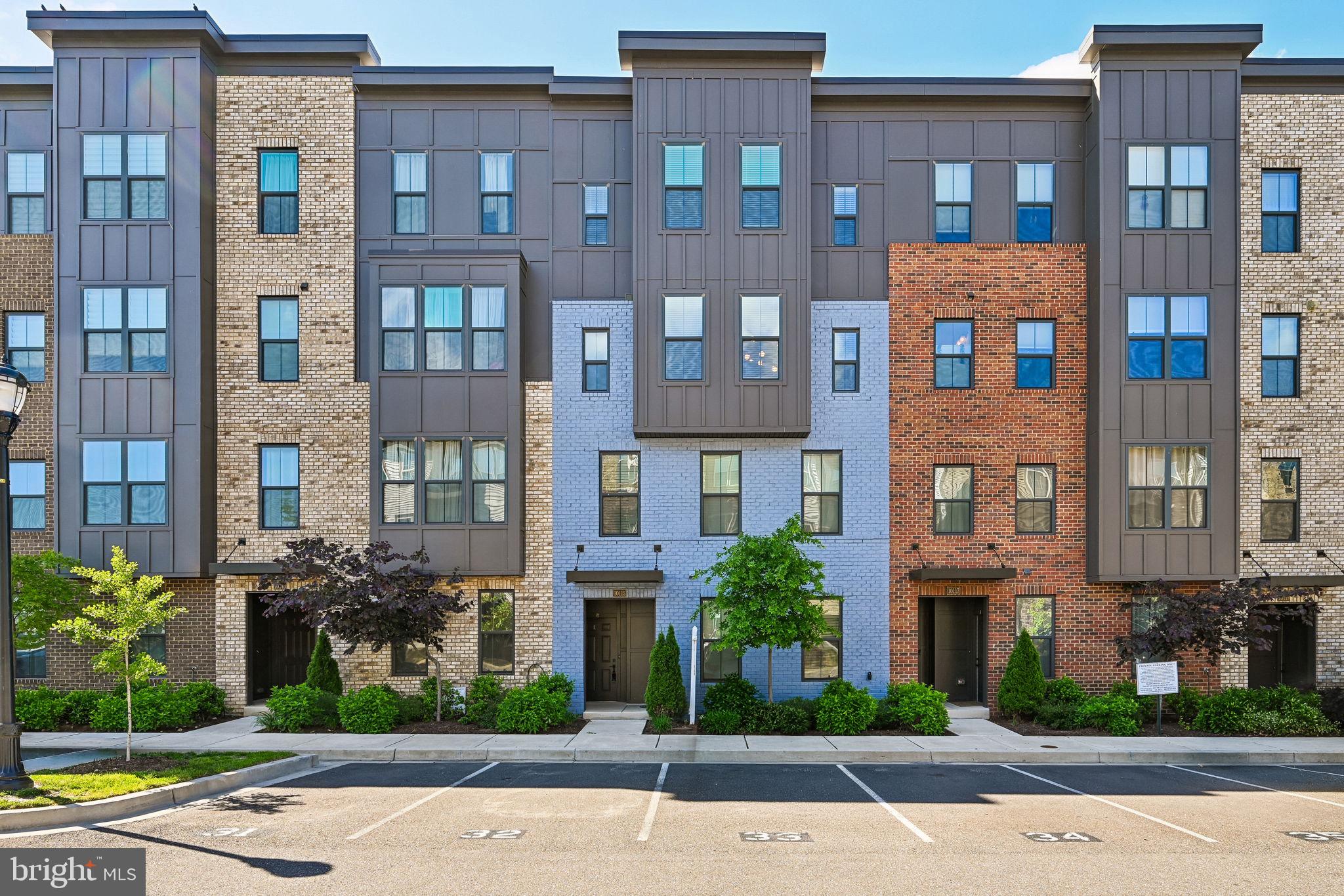 Welcome HOME to this stunning upper-level townhome condominium in the highly sought-after Paddock Pointe community in Howard County! Built in 2021, this beautifully designed home features 3 bedrooms, 2 full baths, 1 half bath, a private balcony, attached garage, and a MASSIVE open floor plan filled with luxury finishes throughout. Sun-filled living spaces, new paint, beautiful LVP flooring, and MASSIVE sliding glass doors create the perfect setting for everyday living and entertaining. The gourmet gas kitchen is a showstopper featuring white 42” cabinetry, quartz countertops, designer pendant lighting, high-end stainless steel appliances, dual oven, gas cooktop with exterior venting, and a massive 16-foot quartz island.
Upstairs, the luxurious owner’s suite offers a massive walk-in closet and spa-inspired ensuite bath with dual  vanities and a spacious walk-in shower. Two additional spacious bedrooms, upper-level laundry, and a large second full bath complete the upper level. This ENERGY CERTIFIED  was constructed with techniques with  that maximizes energy efficiency, water conservation, and environmental preservation. Exterior amenities features private access to the back deck for al-fresco dining/entertaining, a rear-entry 1-car garage and driveway. Exceptional  community amenities include 22 acres of open space, walking trails, dog park, tot lots, and community garden. Ideally located minutes from Routes 29, 32, I-95, the Laurel MARC Train Station, shopping, dining, entertainment, and Howard County schools — this home truly has it ALL! Schedule your showing today!