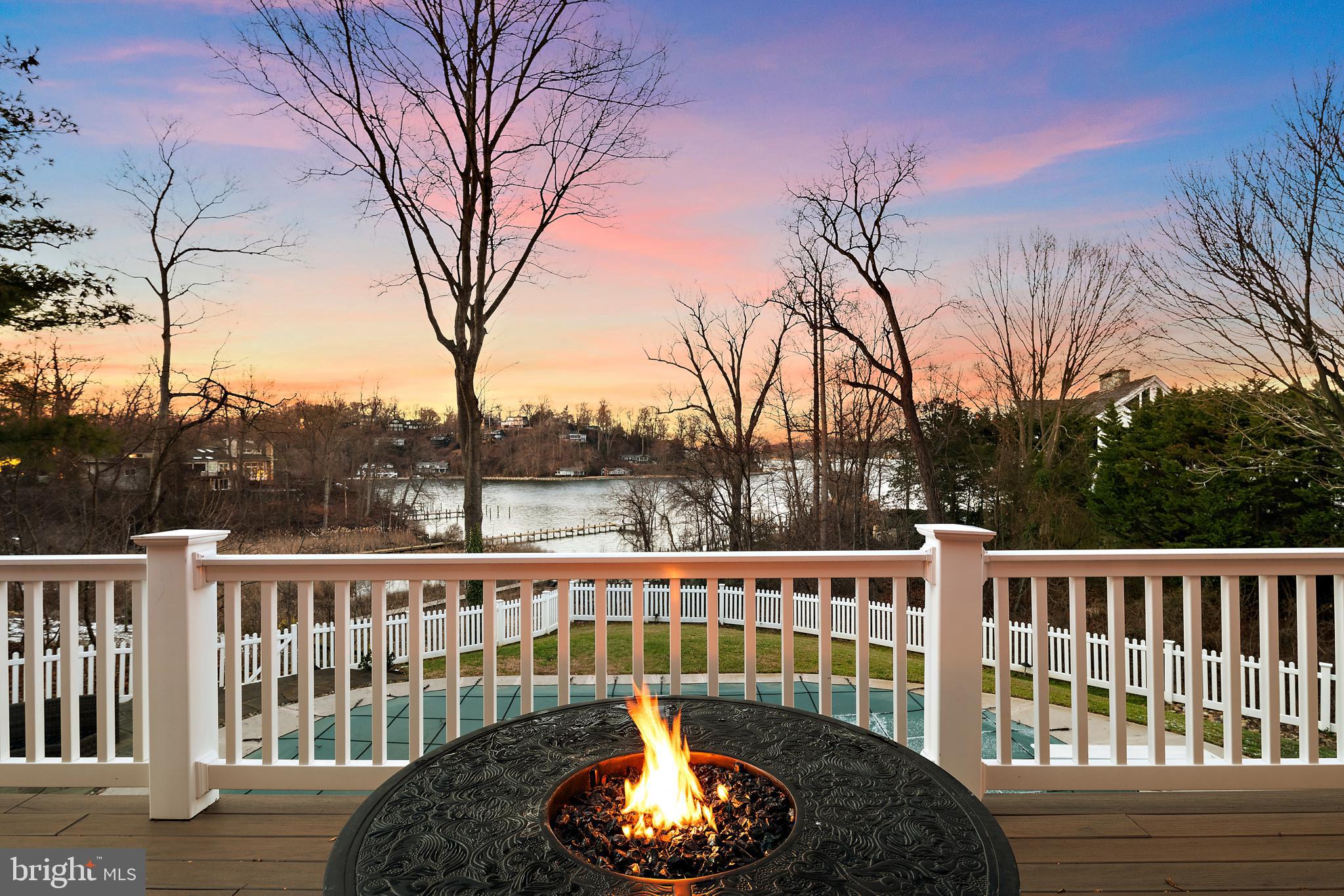 Repriced to Sell on 6.1.26 !! Open House This Saturday, June 6th 11:00am-1:00pm. Wake up to Severn River views, not dock maintenance! 812 Coachway is an all-brick waterfront estate in The Downs on the Severn, offering 6 bedrooms, 7 baths, and over 7,500 square feet of refined indoor-outdoor living. Thoughtfully updated to merge timeless architecture with modern luxury, nearly every room frames stunning Severn River views.

A two-story foyer leads to the office with custom built-ins, living and dining rooms, and a sunroom that opens to expansive decks and terraces. The gourmet kitchen features quartz counters, stainless steel appliances, induction cooktop, and a bay-window breakfast area flowing seamlessly into the family room with fireplace and full bar.

The upper-level primary suite includes a fireplace, brand new spa bathroom with wet room, and a private deck overlooking the water. Four additional bedrooms, multiple updated baths, and an upper-level laundry offer effortless comfort.

The walkout lower level is designed for gathering, with a recreation room, wet bar, exercise/guest suite, and direct access to the pool, patios, and fenced yard. Recent upgrades include new composite decks and refreshed landscaping for a resort-like, low-maintenance setting.

The Downs is one of Annapolis’s premier waterfront neighborhoods, offering:
• Two deep-water marinas with direct Severn River and Chesapeake Bay access
• Kayak & paddleboard launch areas
• Clubhouse, pool, tennis & pickleball courts
• Walking paths and peaceful, nature-rich surroundings

Think morning coffee on the water. Paddleboard before brunch. Wine on the deck at sunset. A serene, elevated waterfront lifestyle with a “waterfront yoga deck” feel and true *lock-and-leave* convenience. Boat slips are available at the marina 2 minutes away!