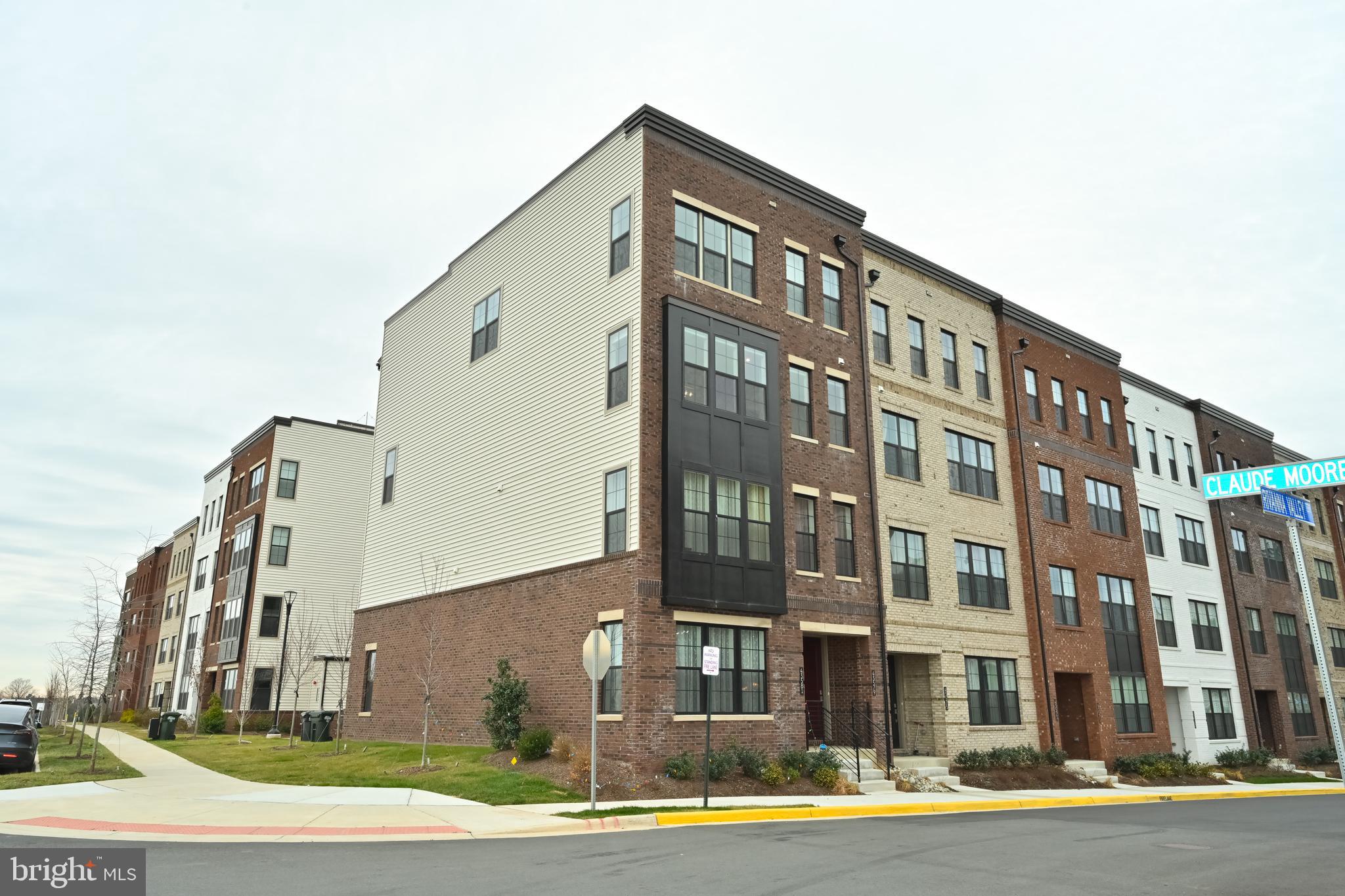Welcome Home to this Luxurious and Bright practically brand new 2 Level End Unit Condo  Townhome. Avoid the delays of new construction homes!  OPEN HOUSE SUNDAY January 14  1pm to 3pm
This home features the best of what Toll Brothers (largest model - Walney)has to offer in this community including an extended oversized island in the kitchen with Quartz Countertops and Quartz backsplash. Other upgrades include a luxury master bathroom/bath tub. The large rooftop offers plenty of space and breathtaking views.
Condo Association amenities including a club house with fitness center and zero entry pool, a playground and walking/biking trails. Convenient location- short walk to newly open Ashburn Metro Station on the Silver Line and proposed future restaurants and shopping.