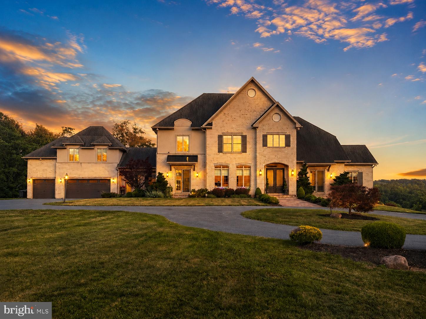 SNEAK PEEK!  - First Time on the Market -  Set on more than 38 ACRES (NO HOA), this extraordinary all-brick estate offers over 9,000 finished square feet, breathtaking views, and a setting that feels worlds away—yet is just 5 minutes from downtown Purcellville.   Surrounded by wooded acreage with open spaces suitable for horses, this 6 BEDROOM, 7 full bath, 2 half bath retreat delivers a rare blend of luxury, privacy, and convenience in the heart of Western Loudoun.   Inside, reclaimed red oak hardwood flooring spans the main and upper levels, while three wood-burning fireplaces add warmth and character. The gourmet kitchen is designed for both daily living and entertaining, featuring premium appliances, custom cabinetry, and generous gathering space. The MAIN-LEVEL PRIMARY SUITE offers a private balcony and spa-like bathroom.  5 upper-level bedrooms include en-suite or adjoining baths.  A private bonus room with en-suite bath and a finished lower level with abundant recreation and entertaining space add flexibility for the way you live.   Outside, the saltwater POOL with travertine decking, extensive hardscaping, professional landscape lighting, and sweeping views create a true resort-style setting. Other highlights include two laundry rooms, an oversized three-car garage, paved driveway, and whole-house generator. A rare opportunity to own a private Purcellville estate with room to spread out and every amenity just minutes away.  24 hour notice and pre-approval letter/proof of funds required for all showings.