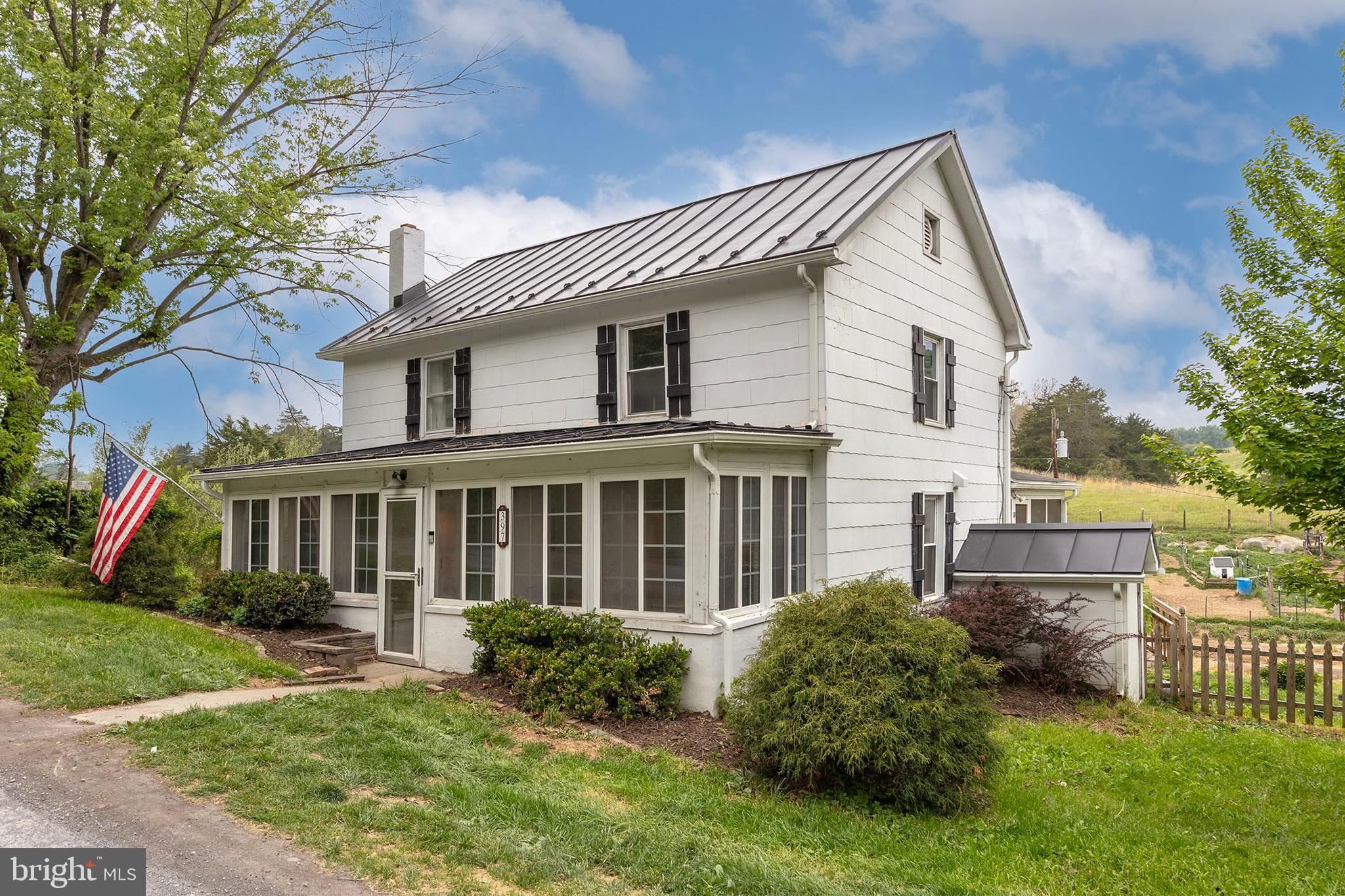 Owners says SELL......  $ 50,100.00 price reduction.  Easy to show,  Priced $ 63,100.00 below current (February 2026). appraisal of $ 463,000.00. 
This offering includes a 3 Bay garage with direct road frontage,, concrete floor with  a walk down "oil pit", great for the car enthusiasts OR a source of rental income for the home mechanics  Additionally there is a detached building which was partly used as a home office by the previous owners - and of course there is the barn.  

A wonderful mini farmette presented here as a renovated Farmhouse on 1.46 Acres with beautiful mountain views.  Oversized new deck to watch the sunrises plus the enclosed  front porch for those rainy days.  Add a side screen porch as well for your enjoyment.
The kitchen is bright an inviting with exposed ceiling beams, backsplash, painted brick wall and a beautiful back splash. new stove and farm sink,.  The first level has a very functional circular flow.  Upstairs you will find the Master Bedroom plus 2 additional smaller bedrooms.   Shentel provides Internet Service. 
The property has numerous outbuildings  and currently used as an active farm with a variety animals.   
To the rear of the property there is a barn with water and electric in addition to the 2 other detached structures mentioned before. 
New Metal roof in 2022, New HVAC 2021 with whole house dehumidifier and added second floor ducted HVAC in 2024. New winds upstairs, Insulated attic 2021, and the new flooring was also installed  in 2021.  New Gutter with Guards installed 2024.