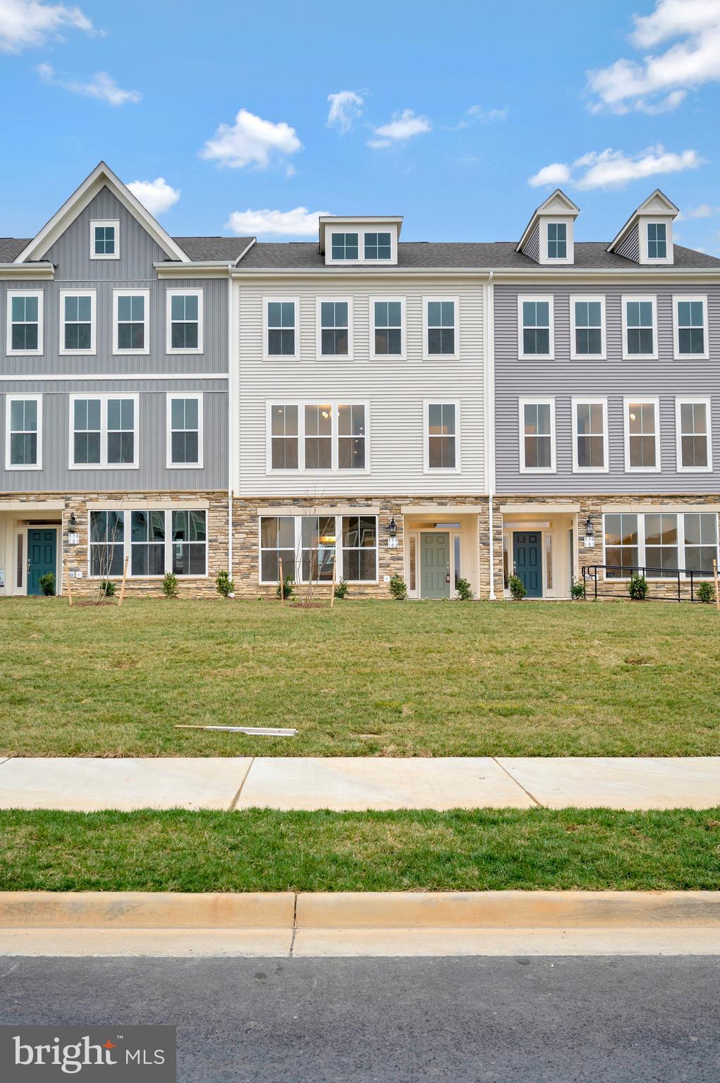 Not even a year-old townhome in Embrey Mill that brings work and life together. With relaxed designs that are more than just a look, but a feeling that extends beyond your four walls. Embrey Mill’s everything lifestyle rises to any occasion.  These brand-new townhomes come with a two-car garage, paved driveway, and a deck. You will fall in love from the moment you walk in. This is an interior unit full of natural light, spacious, and has a wonderfully appointed kitchen with stainless steel appliances, a center island, and a pantry. The kitchen is the center of the home and will make entertaining a breeze. The owner's suite has its en-suite bath with a double vanity and a large walk-in shower. Two more bedrooms, another full bath, and the laundry area finish the upper level. All of this plus a separate office, featuring its entrance and a half bath. Enjoy the quiet as you work from home.