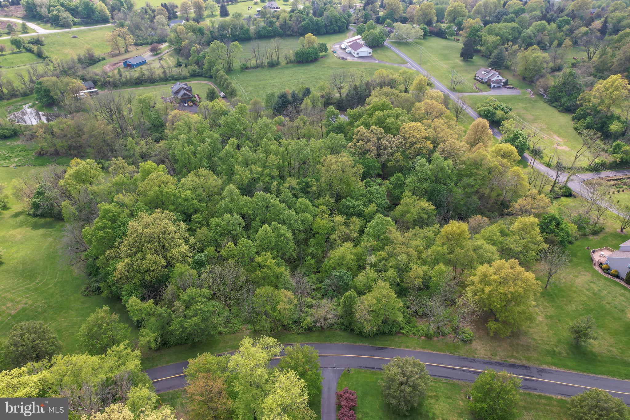 This 2.20-acre lot is in a great location,  easy access to major arteries. Come walk the lot. Bring your builder.