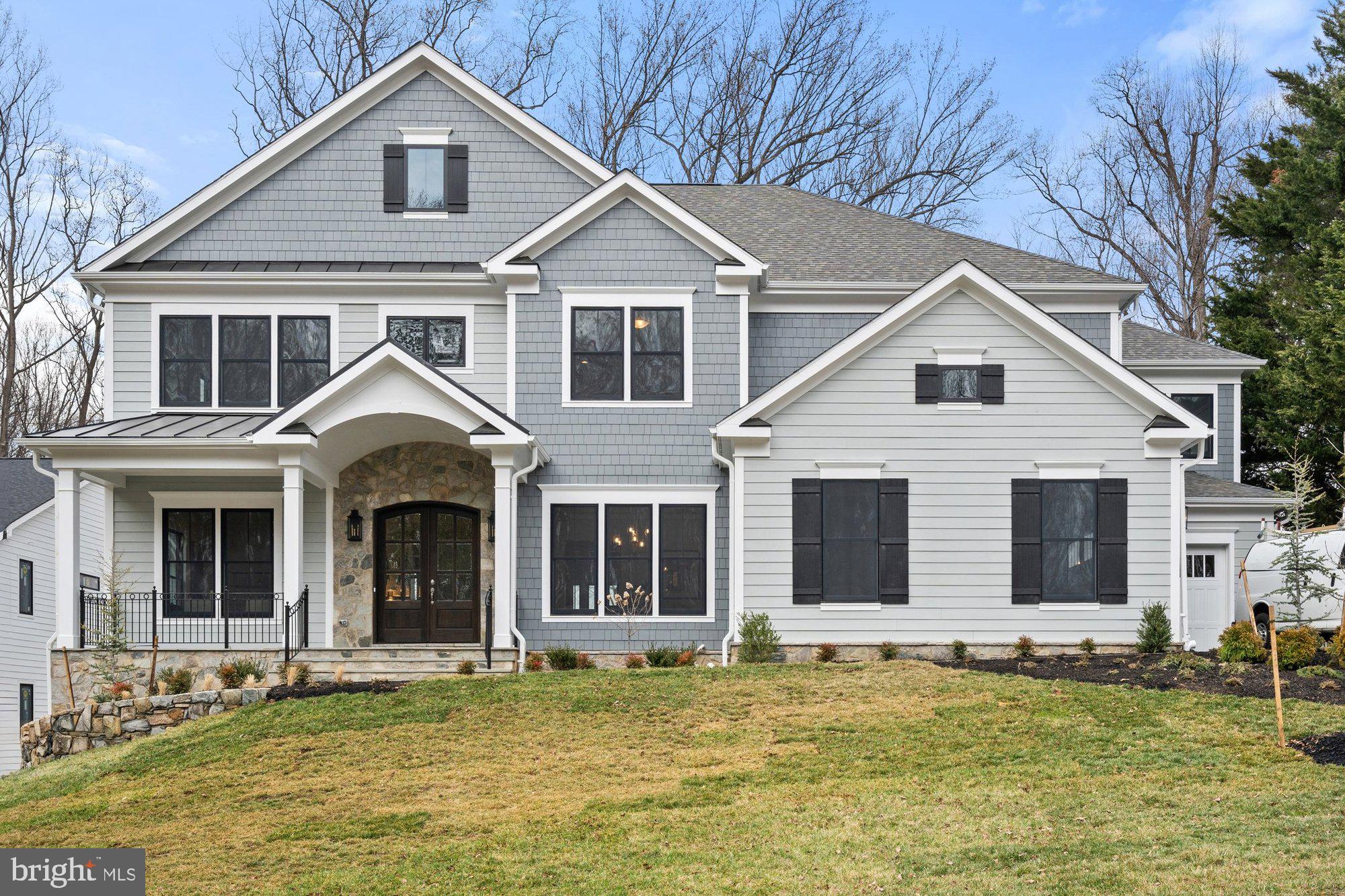 *** Price Improvement! Immediate Delivery! *** Introducing *The Alexander*, an exciting new home design by Sekas Homes, on a fabulous Falls Church homesite. This modern masterpiece spans 7,027 square feet across three finished levels and is set on an expansive, wooded 0.46 acre lot with a private rear yard perfect for outdoor living and entertaining. This stunning residence includes six spacious bedrooms and 6.5 luxurious baths. The main level boasts a guest suite, ideal for visitors, and the 9-foot ceilings on all levels enhance the sense of openness and light. Whether you’re hosting a formal gathering or a casual get-together, the floor plan offers both private family spaces and open gathering areas to suit any occasion. The gourmet kitchen is a chef’s dream, with custom cabinetry, a walk-in pantry, and ample space for meal preparation. The luxurious primary suite includes an impressive walk-in closet and dressing area, as well as a deluxe bath with a soaking tub, separate shower, and private water closet. The finished lower level is designed for entertainment and relaxation, featuring a recreation and game area, an exercise room, a bedroom, and a full bath. Perfect for all ages, The Alexander offers spaces that are both functional and inviting. Outdoors you will find a screened porch with a Trex deck, offering a seamless connection to nature. Additional features include a 3-car garage (with a 2-car side load and 1-car front load), and a location just minutes from Great Falls St, Rt 66, shops, dining, and the METRO. This is the ultimate in modern luxury living! Haycock/Longfellow/McLean pyramid