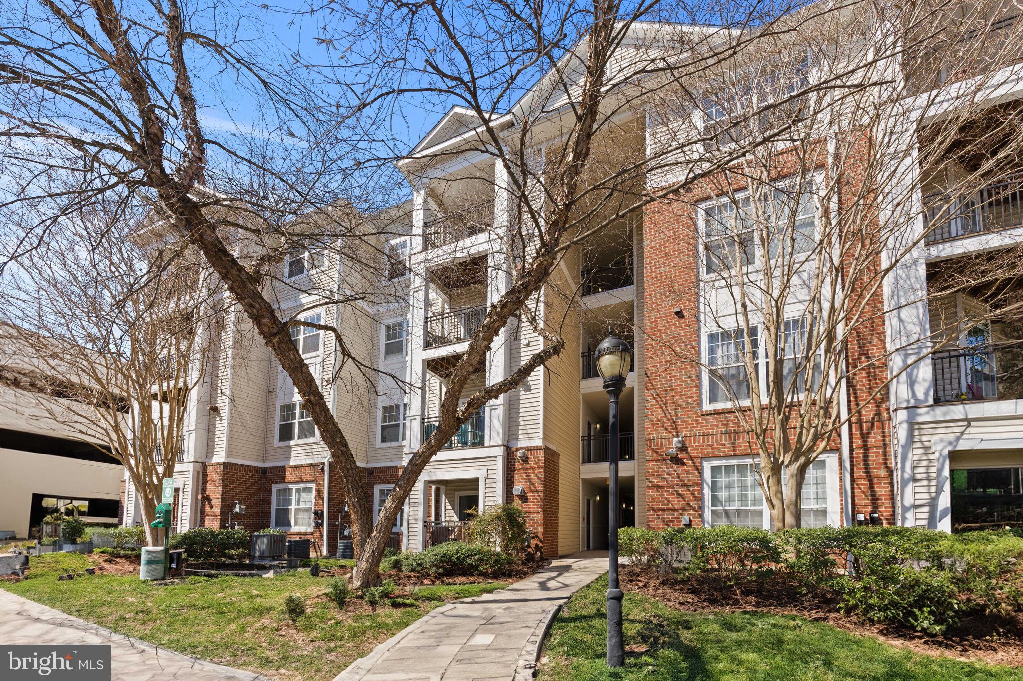 Welcome to Centre Park, a sought-after gated community in the heart of Herndon! Unit #103 is a beautifully maintained 1-bedroom, 1-bathroom condo that blends comfort, convenience, and modern updates. Step inside to find brand-new luxury vinyl plank flooring, fresh and stylish underfoot, complemented by abundant natural light that creates a warm and inviting atmosphere. Recent upgrades include a new furnace, a new hot water heater, two new ceiling fans, a new washer and dryer, and a new refrigerator, making this home move-in ready! Living in Centre Park means enjoying resort-style amenities designed for relaxation and convenience. Unwind by the sparkling pool, stay active in the fitness center, or host gatherings in the elegant clubhouse. With a secure gated entrance, you'll also have added peace of mind. The location is unbeatable—just steps from shopping and dining, with easy access to major commuter routes, the future Herndon/Monroe Silver Line Metro stop, downtown Herndon, Reston Town Center, and more! Don’t miss the opportunity to own this stylish, low-maintenance home in a prime location. Schedule your tour today!