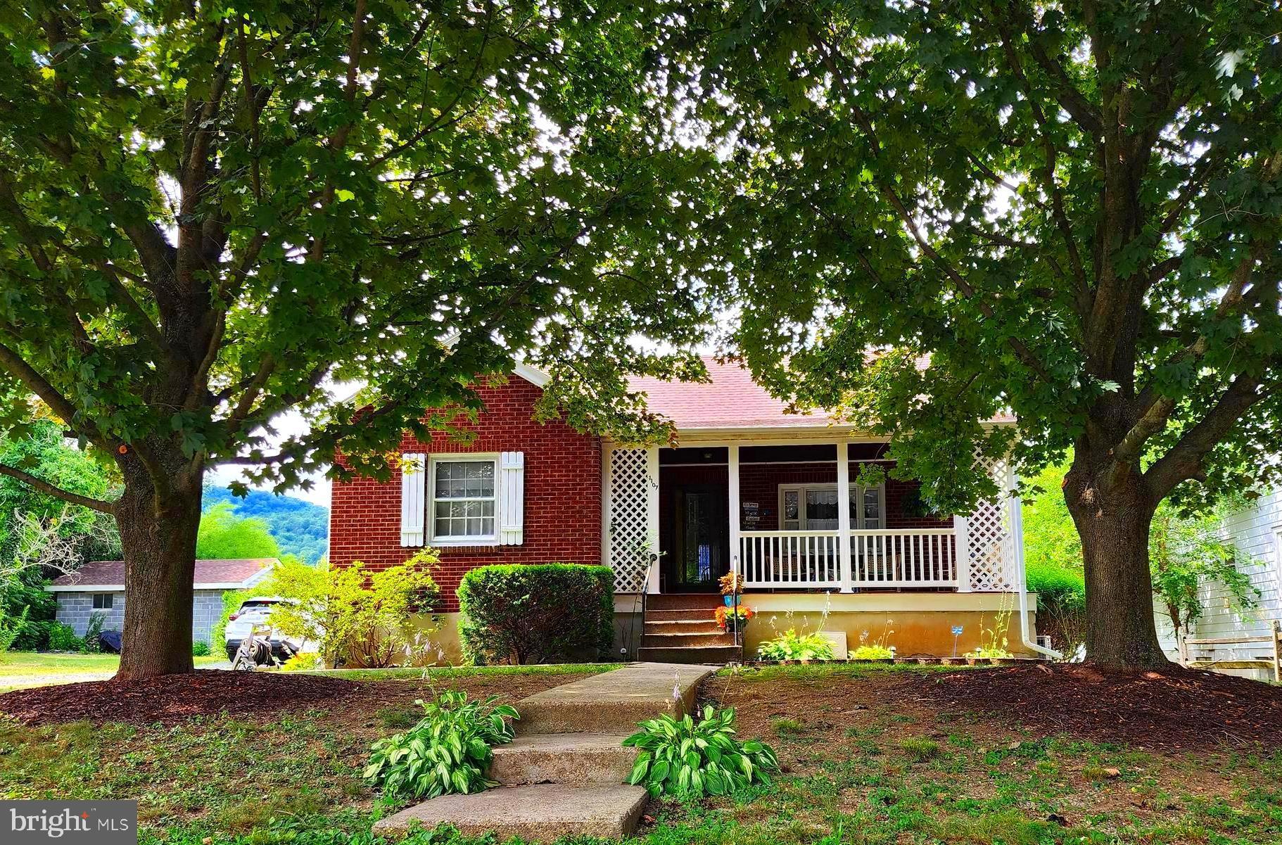 Discover the charm of Mountain Maryland with this classic 3-bedroom, all-brick home in a prime LaVale location. Featuring hardwood floors throughout, central air, and updated amenities including new gas heat (5 years old) and a new roof (3 years old), this residence offers both comfort and convenience. The upper level boasts an expansive finished bedroom/loft, while the full basement provides ample storage space. Outside, a fenced rear yard and an additional lot with a detached one-car garage offer flexibility and plenty of parking. Enjoy the ease of move-in readiness and proximity to shopping, parks, trails, and more. Don't miss out—schedule your tour today!