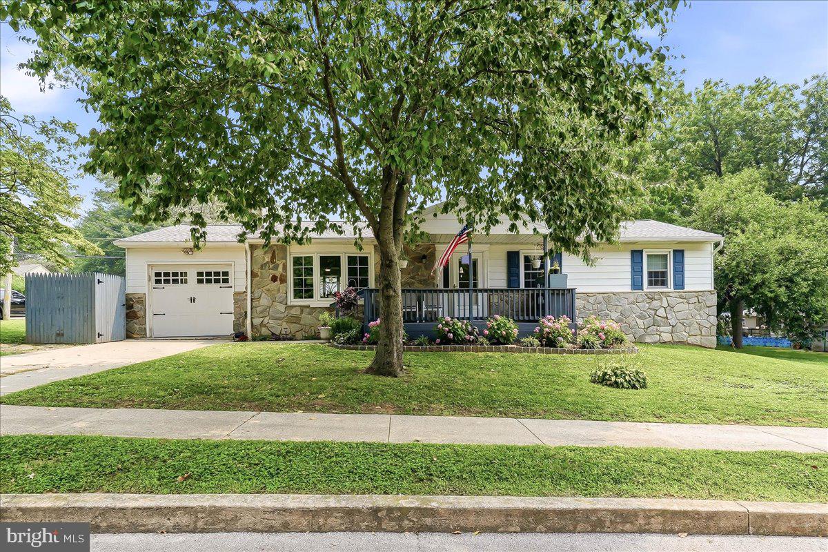 This home is Move In Ready! The current owners thought of everything and the attention to detail is evident throughout. This lovely ranch home is situated on a large corner in the Borough of Oxford and features large shade trees and perennial plantings. As you walk through the front door a primary feature of the living room is the stone fireplace with custom mantle and built in shelving. The eat-in kitchen offers custom cabinetry, with pullout drawers, gas stove and hood vent and tile backsplash. Adjacent to the kitchen is a first-floor laundry with pantry storage. The primary bedroom has an ensuite bathroom with a tile shower and custom walk-in closet. Luxury Vinyl flooring throughout really offers a beautiful look as well as easy, durable maintenance. The full basement is currently being used as a wood shop and has Bilko access, updated lighting and built in shelving. This space offers plenty of storage and could easily be finished if you need additional living space. Many updates include water proofing, lighting and newer HVAC, replacement windows, roof and gutter guards.