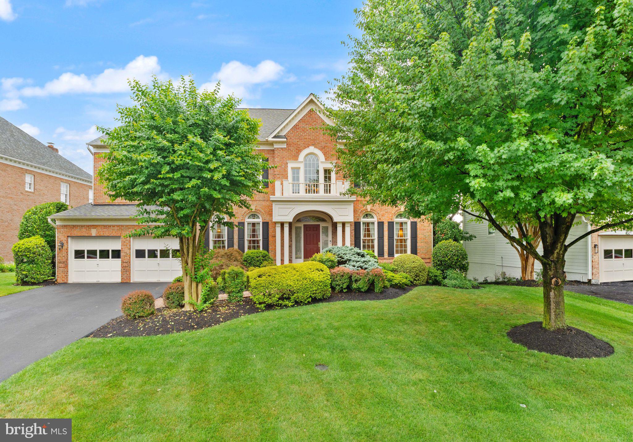 Exceptional Renaissance Grand Botticelli estate home offering more than 6,500 square feet across three finished levels on a premium golf course lot backing directly to the 11th fairway in the sought-after gated community of River Creek. Expansive windows, a large Trex deck, and multiple outdoor living spaces showcase incredible golf course views and create a beautiful backdrop for everyday living and entertaining.

A dramatic two-story foyer with a circular design, extensive moulding, architectural niches, and a sweeping staircase with wrought iron balustrades creates an elegant first impression and offers open sightlines throughout the main level. Hardwood flooring extends through the living room, dining room, kitchen, and adjoining spaces. The formal living and dining rooms feature detailed moulding, while a butler’s pantry provides convenient additional serving and storage space.

The spacious kitchen is designed for both function and gathering with upgraded cabinetry, granite countertops, a tile backsplash, cooktop, built-in microwave, double wall ovens, pendant lighting, and a large island with breakfast-bar seating. French doors connect the kitchen to the formal dining room, while the sun-filled breakfast room is wrapped in windows overlooking the golf course. The adjoining family room is equally impressive with a dramatic coffered ceiling, built-in gas fireplace, expansive wall of windows, and a distinctive inset carpet bordered by hardwood flooring.

A thoughtfully designed home management center features beautiful built-in cabinetry and a desk, offering flexible space for working from home, organization, homework, or hobbies. Golf course views, access to the rear staircase, and a nearby laundry room add to the functionality of this inviting space. A powder room completes the main level.

Upstairs, the expansive primary suite enjoys picturesque golf course views, a tray ceiling with ambient lighting, a spacious sitting area with a gas fireplace, and two walk-in closets. A distinctive vestibule area with an oversized picture window adds architectural interest while framing another beautiful view of the golf course. The luxurious primary bath features separate vanities, a large soaking tub, separate glass-enclosed shower, and ceramic tile flooring. The upper level offers three additional bedrooms and two additional full baths, including a private bath and a thoughtfully designed Jack-and-Jill bath with a separate vanity area. A spacious loft provides flexible space for an upper-level office, reading area, homework station, or second family room.

The walkout lower level is designed for entertaining with extensive moulding, arched openings, recessed lighting, hardwood flooring, ceramic tile, carpeted areas, and abundant natural light from numerous windows with plantation shutters. Multiple gathering spaces include a large recreation room, billiards area, and card or game room. The full wet bar is beautifully appointed with granite countertops, custom cabinetry, a sink, full-size refrigerator, dishwasher, and pendant lighting. A full bath with an elegant vanity and glass-enclosed walk-in shower, generous storage space, and access to a covered patio complete the lower level.

River Creek is a premier gated golf community along the Potomac River offering resort-style amenities including miles of scenic trails, parks, a canoe and kayak launch, fitness center, pools, clubhouse with river views, tennis, and pickleball. Optional golf memberships are available. Conveniently located near shopping, dining, wineries, historic towns, One Loudoun, Village at Leesburg, Historic Downtown Leesburg, Ashburn Metro, Dulles International Airport, and major commuter routes including Route 7, Route 28, the Dulles Toll Road, and the Dulles Greenway.