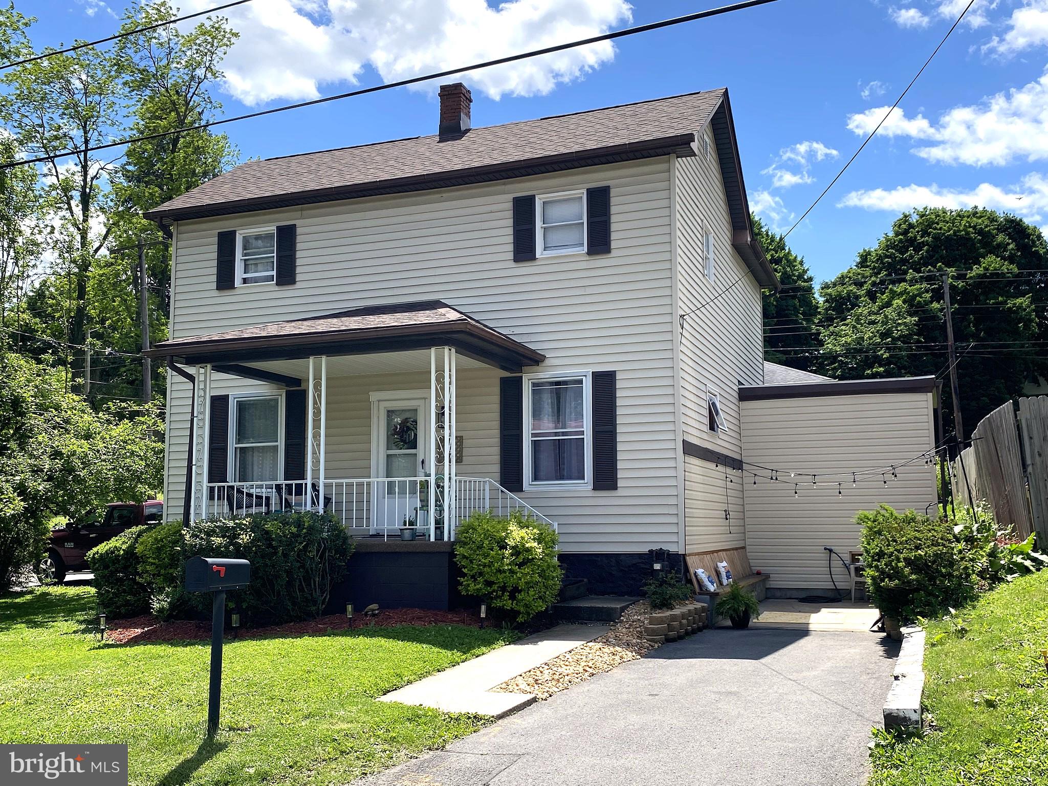 You'll love this gorgeous, updated, two-story home nestled in the mountains of Western Maryland. This 2-bedroom, 2 bath home will give you generous space to move about (without losing that quaint, cozy atmosphere). Entertaining is easy with this lighted outdoor patio space, with built-in bench seating.  Upon entering the front door, you will see the original open staircase and high ceilings. The design of this space is like it just came out of a magazine... from the accent walls in the dining room, the two-tone painted kitchen cabinets, to the elegant second floor bathroom.  The second-floor bathroom features a double vanity, original claw foot tub, and glass enclosed shower.   Adjacent to the primary bedroom is a separate office space or added bonus room on the second floor. The kitchen has elegant brass hardware and ample counter space.  The laundry room is easily accessible on the main floor, with a second full bathroom.  This property is located close to all modern amenities. Call Today to Schedule a Tour!!!

*** Some images are AI-generated/virtually staged for illustration purposes only. Please visit and tour the property in person to verify actual condition and features.